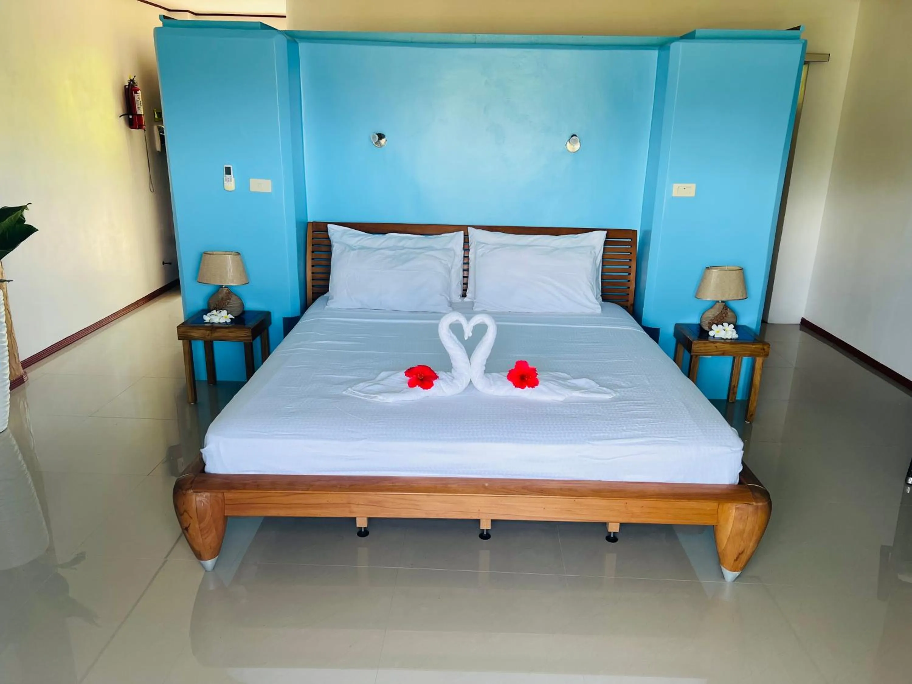 Bed in Cabilao Sunset Dive & Beach Resort