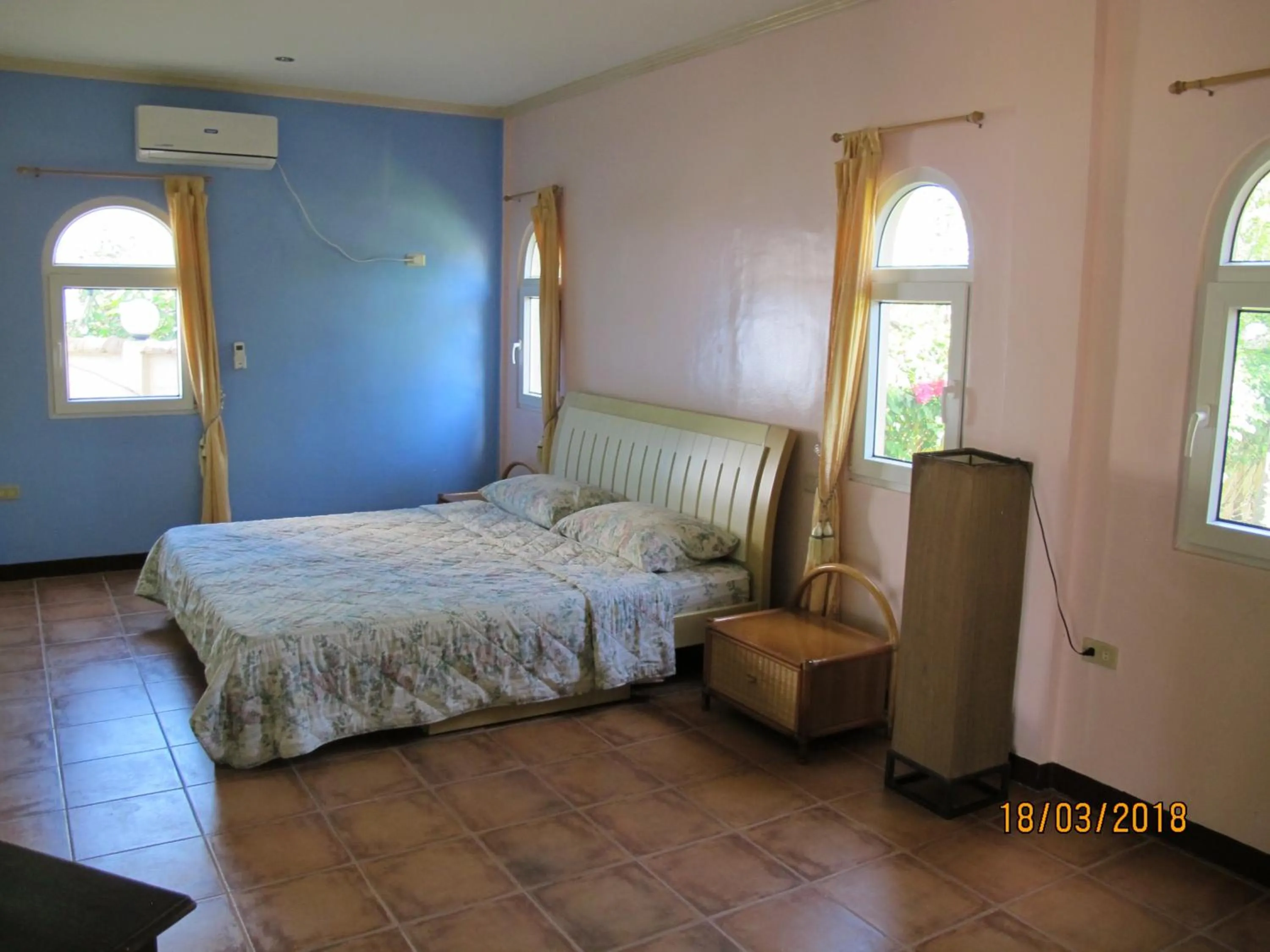 Bed in Cabilao Sunset Dive & Beach Resort