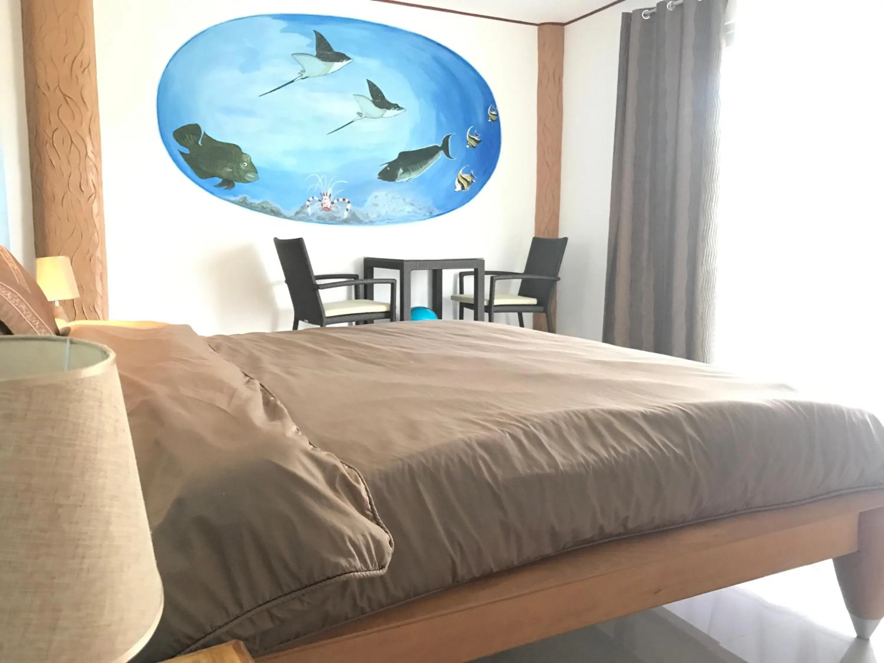 Bed in Cabilao Sunset Dive & Beach Resort
