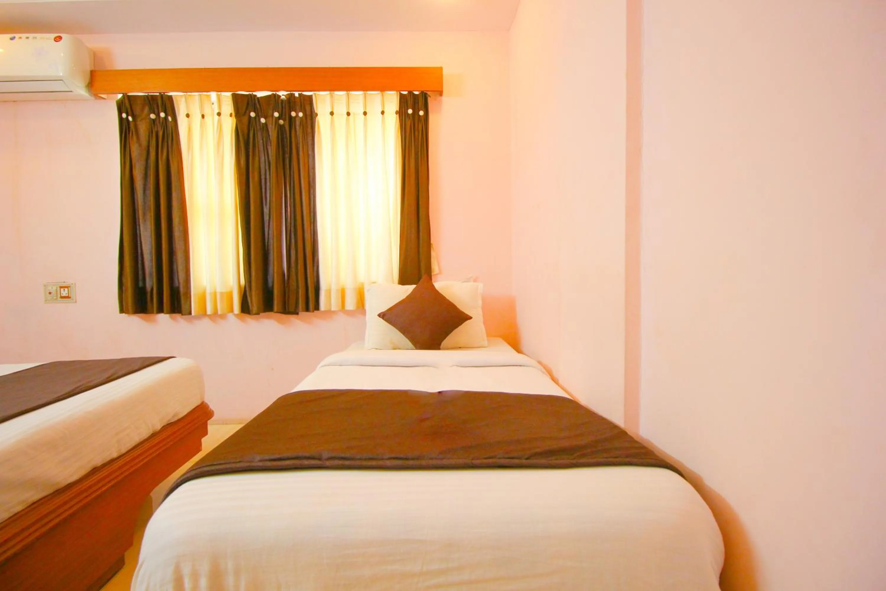 Bed in Hotel Upasana