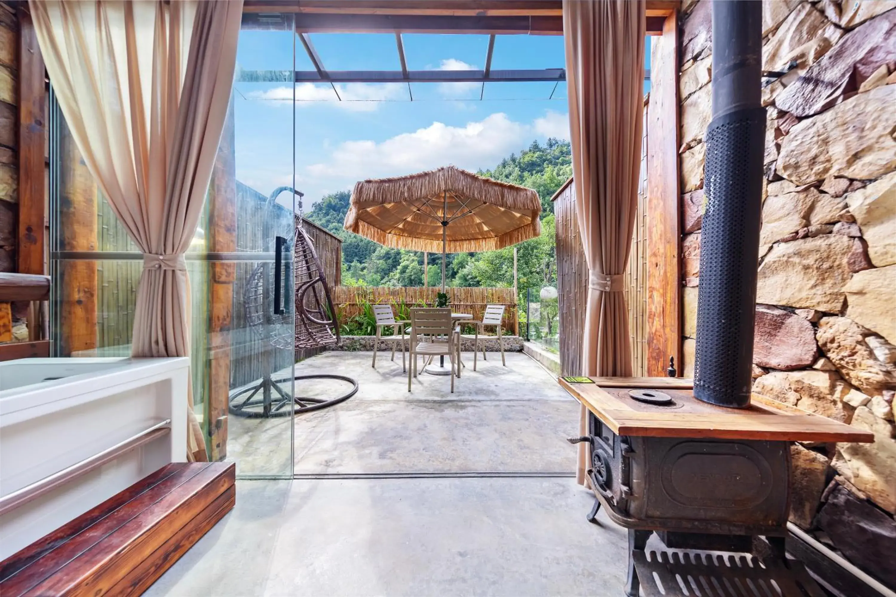 Courtyard Deluxe King Room with Small Courtyard, Grass Umbrella, Swing, and Fireplace in Pandora Vista Retreat Courtyard Deluxe King Room with Small Courtyard, Grass Umbrella, Swing, and Fireplace in Pandora Vista Retreat