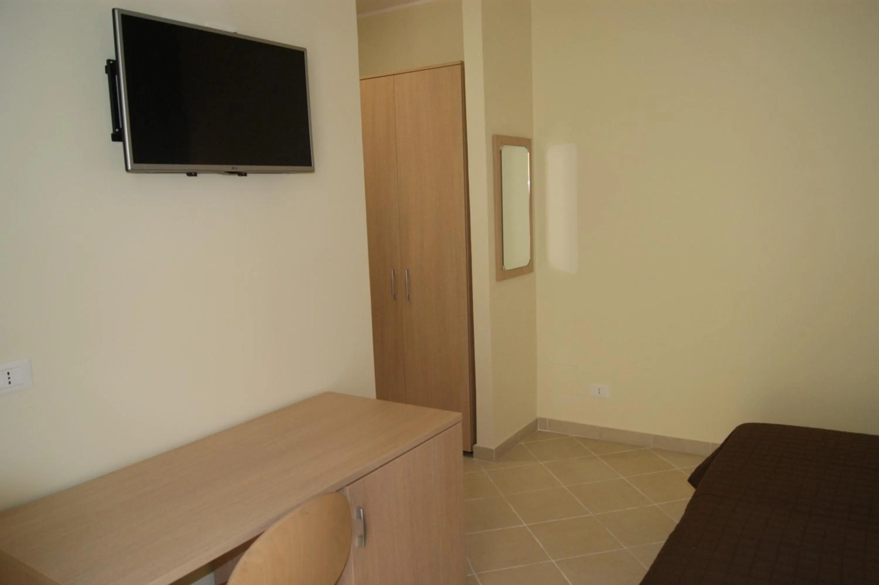 Photo of the whole room in Guest House Golfo Xifonio