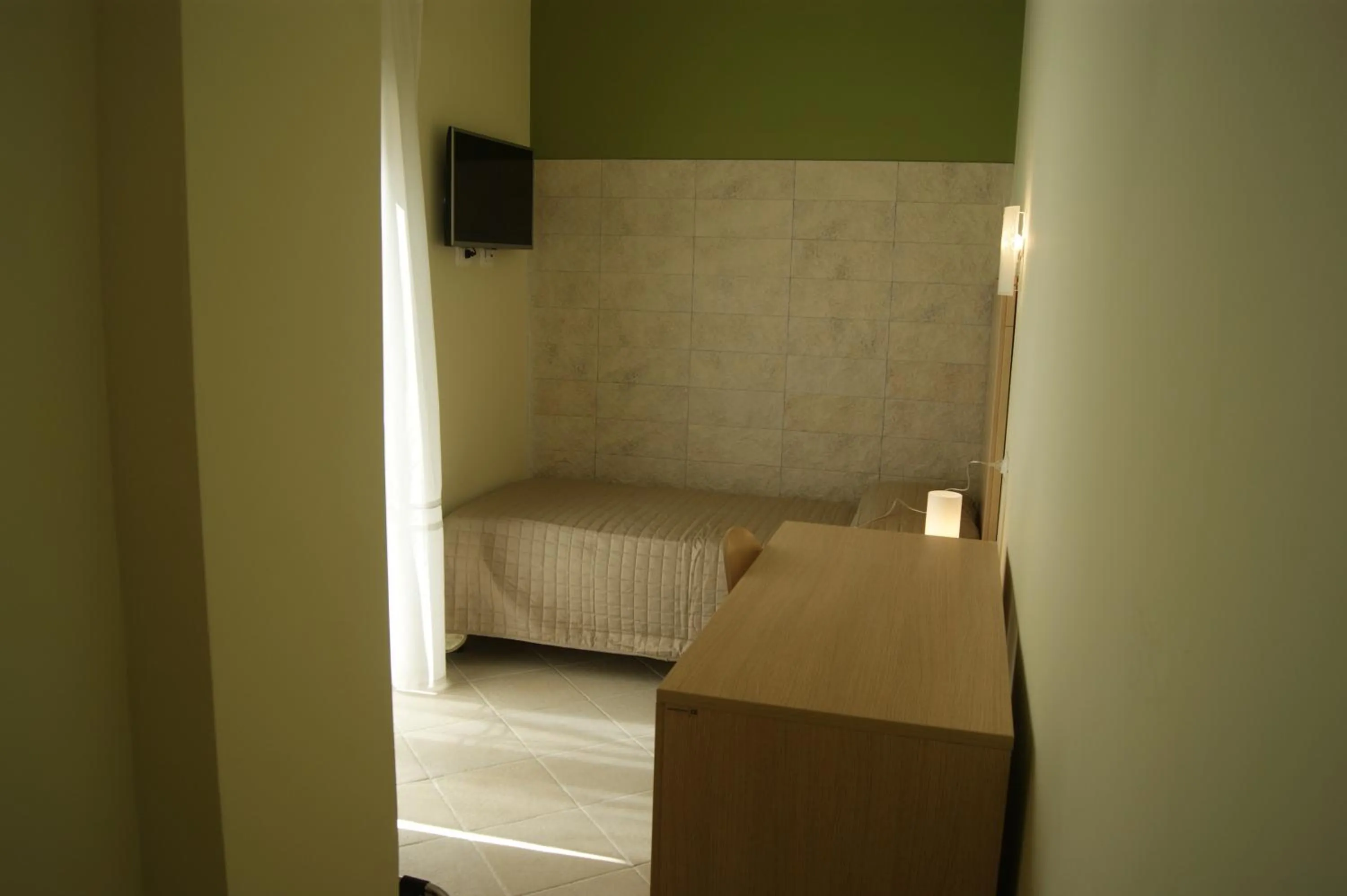 Photo of the whole room in Guest House Golfo Xifonio