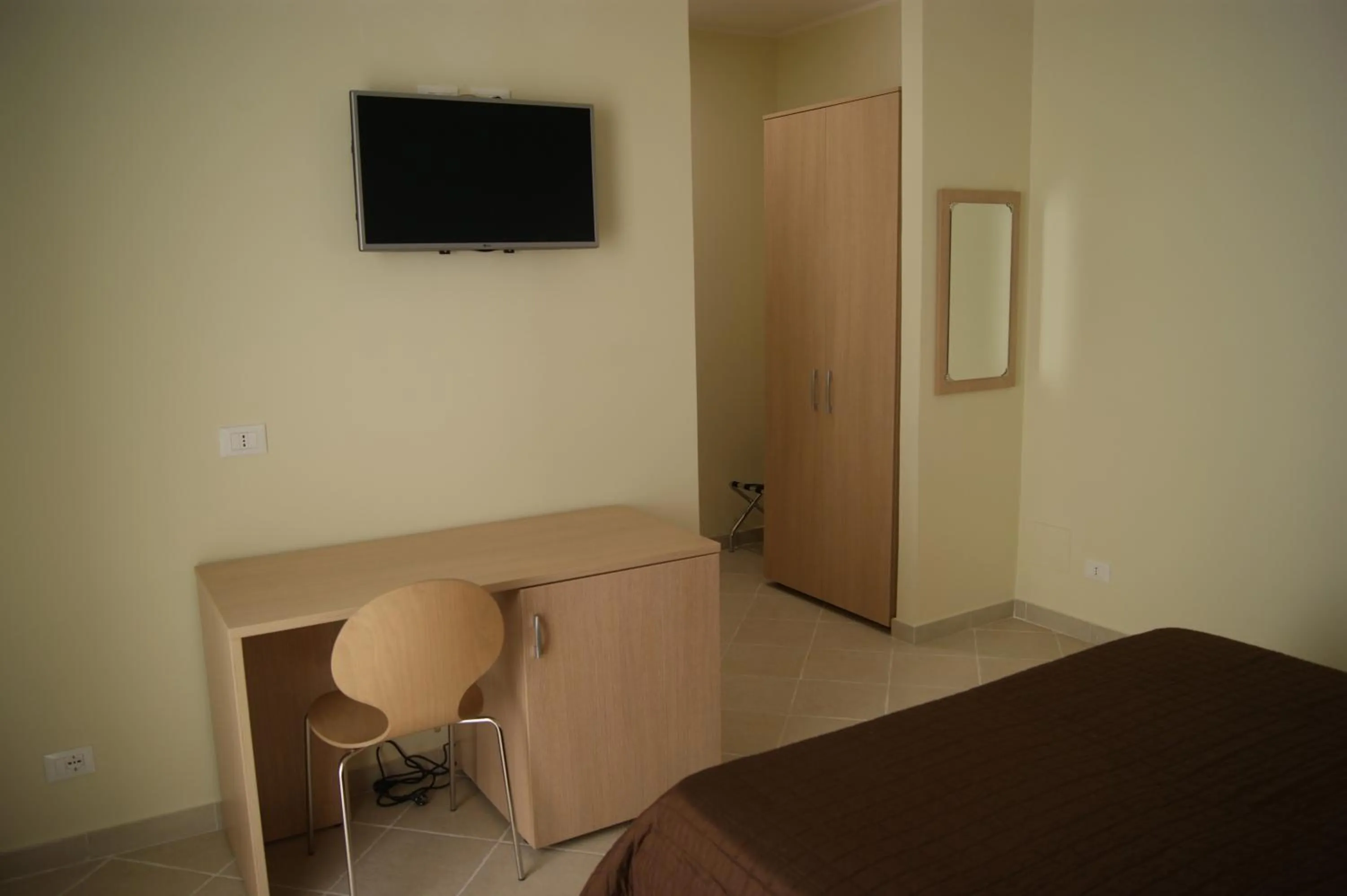 Seating area, Bed in Guest House Golfo Xifonio