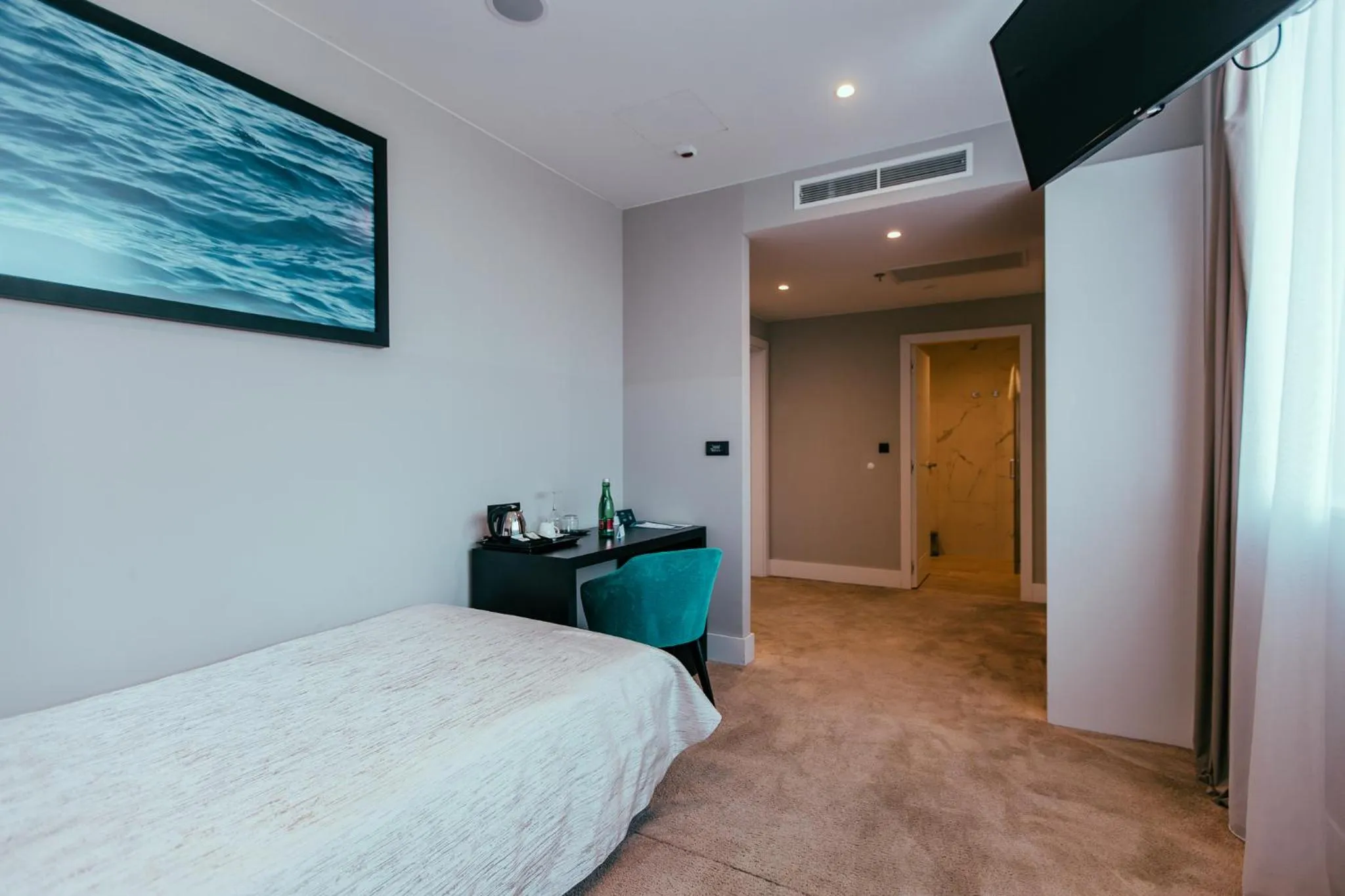 TV and multimedia, Bed in Marvie Hotel & Health