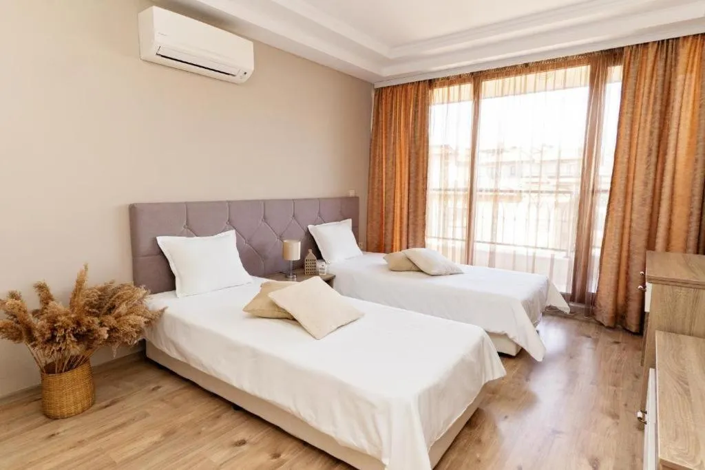 Bed in Burgas Beach Resort Apartments