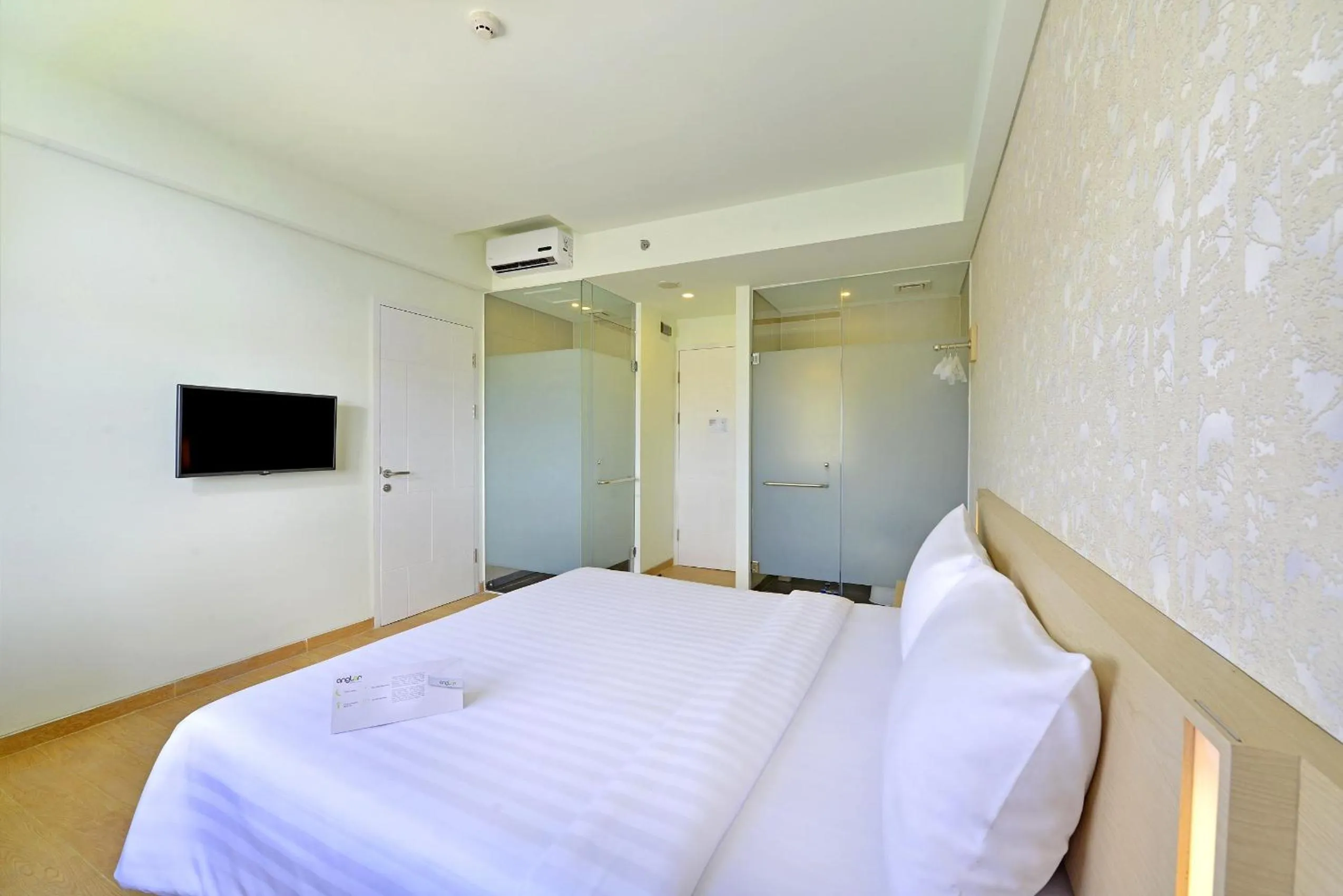 Bed in Whiz Prime Hotel Sudirman Cilacap