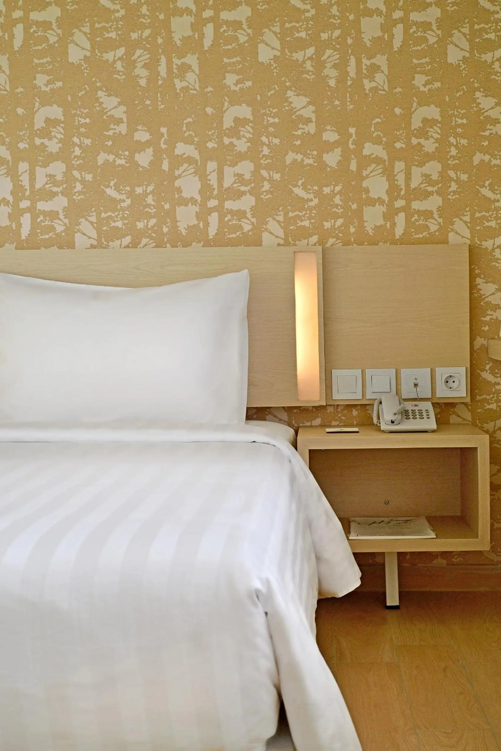 Bed in Whiz Prime Hotel Sudirman Cilacap