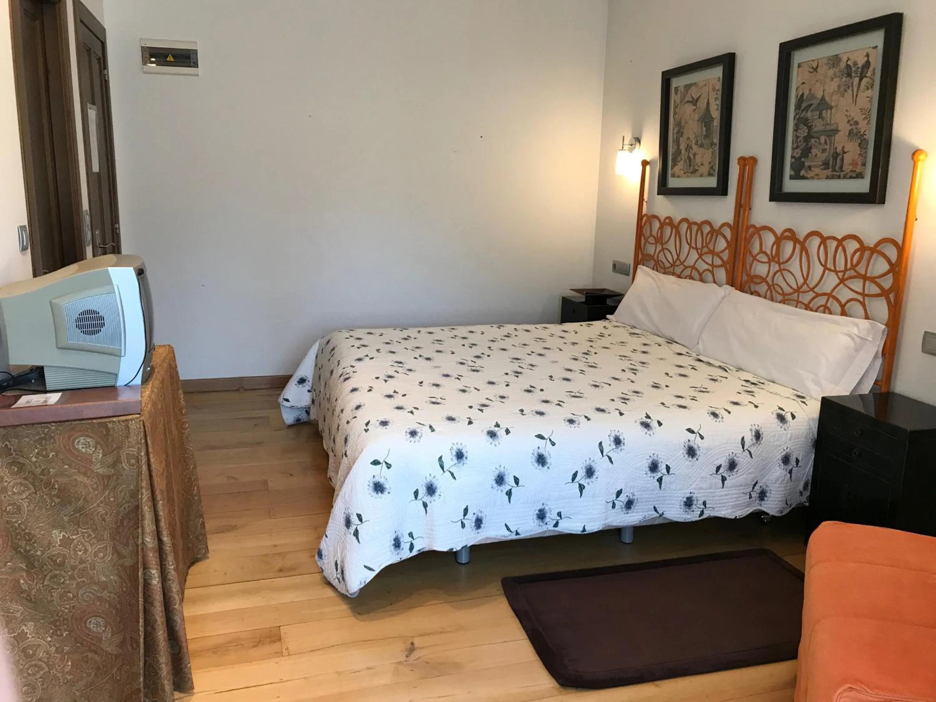 Bed in Hotel y apartamentos rurales L'Anceo