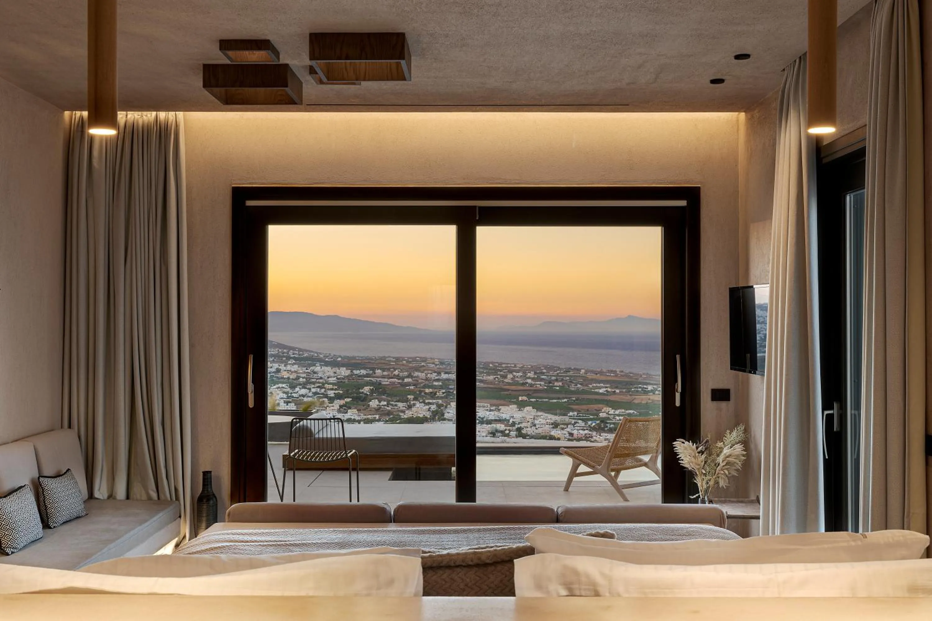 Bed in North Santorini - A Luxury Spa Hotel