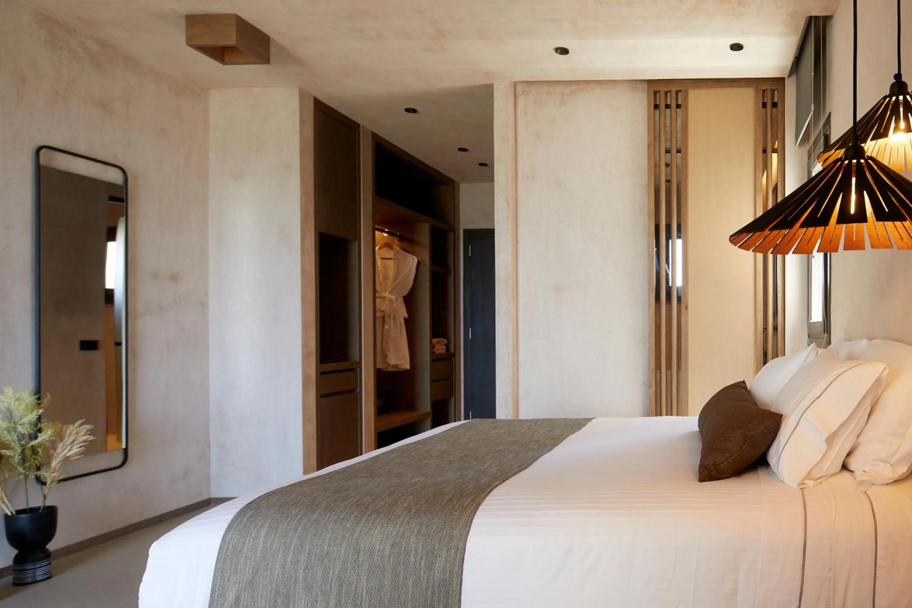 Bed in North Santorini - A Luxury Spa Hotel