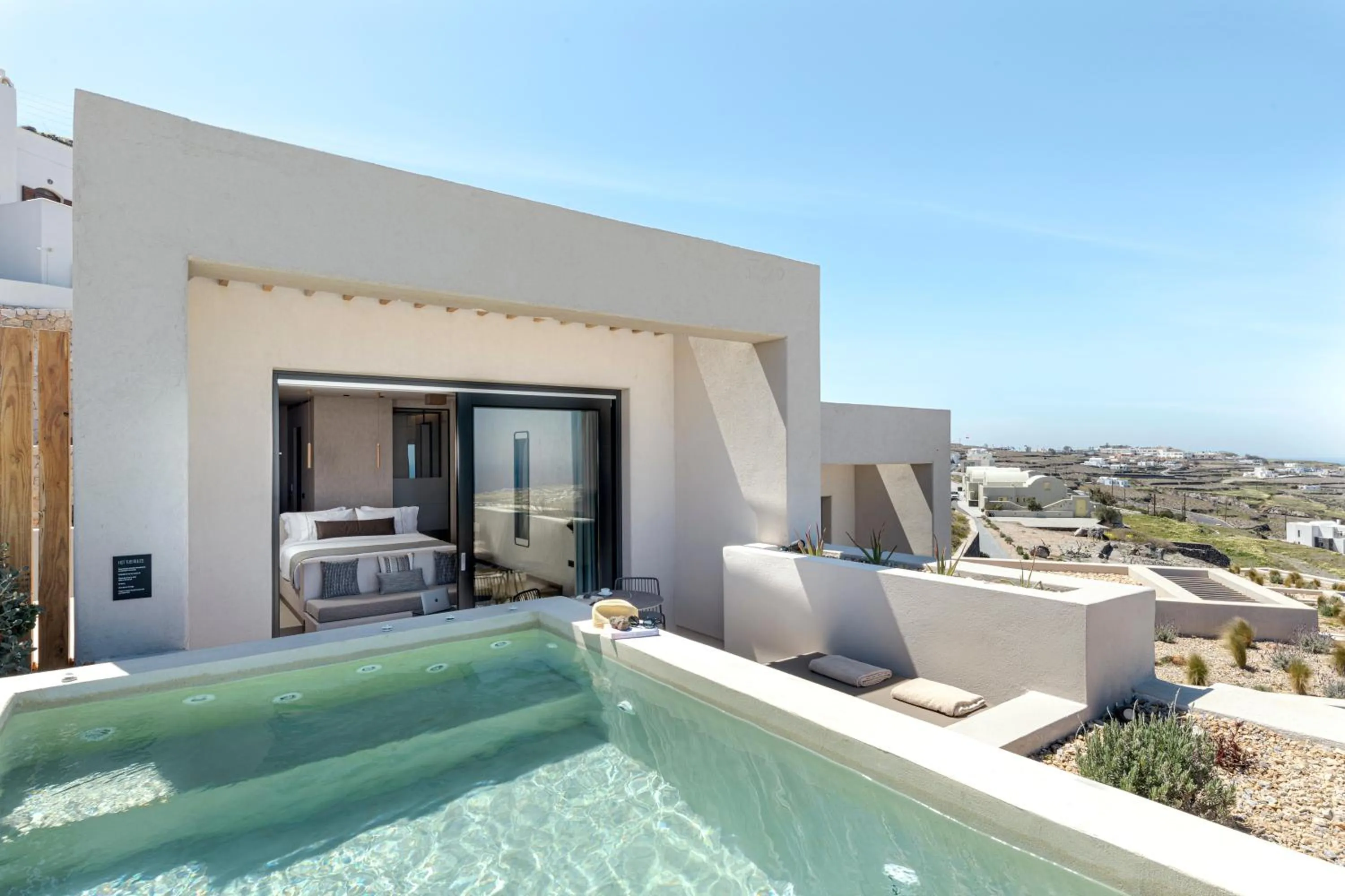 Bed in North Santorini - A Luxury Spa Hotel