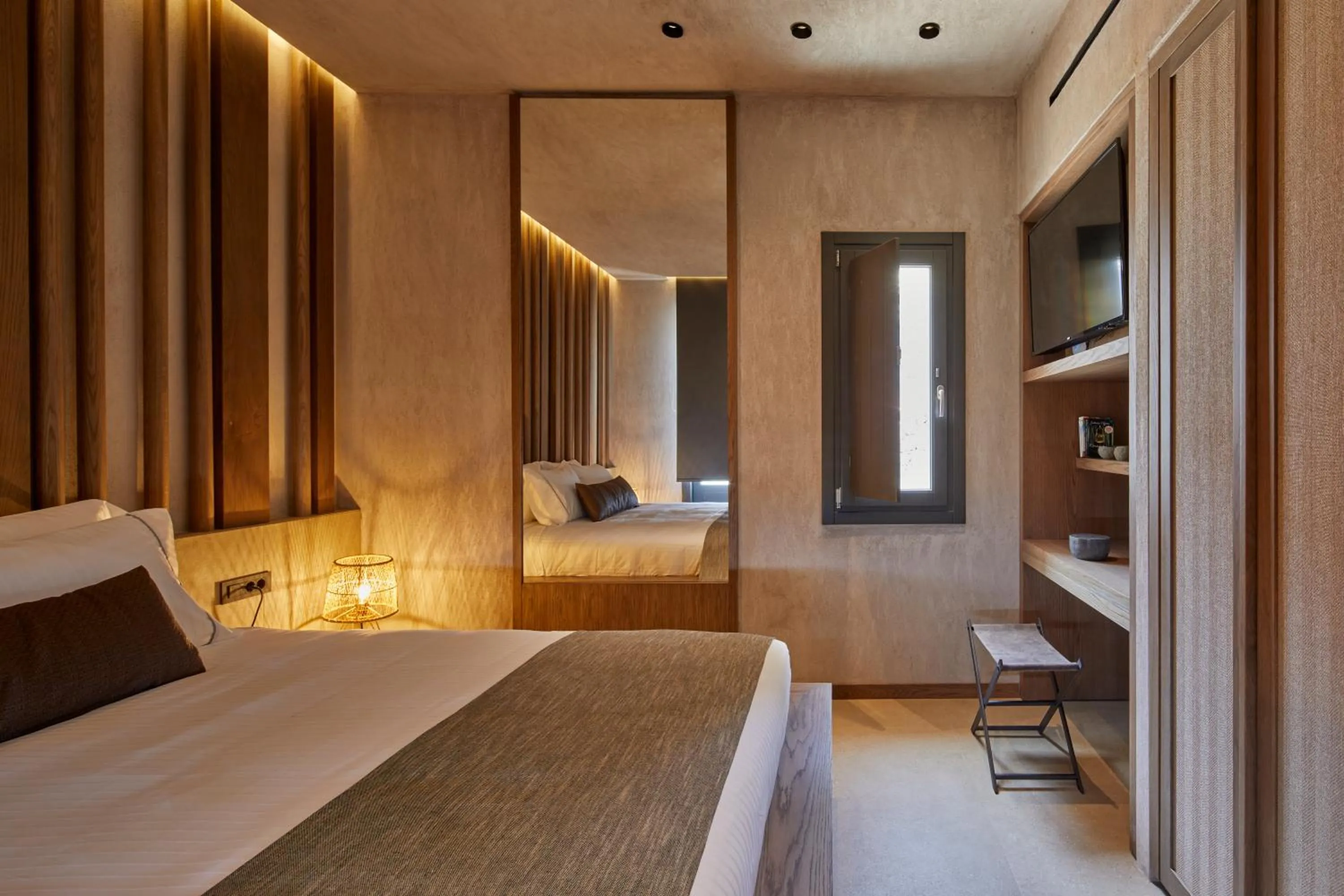 Bed in North Santorini - A Luxury Spa Hotel