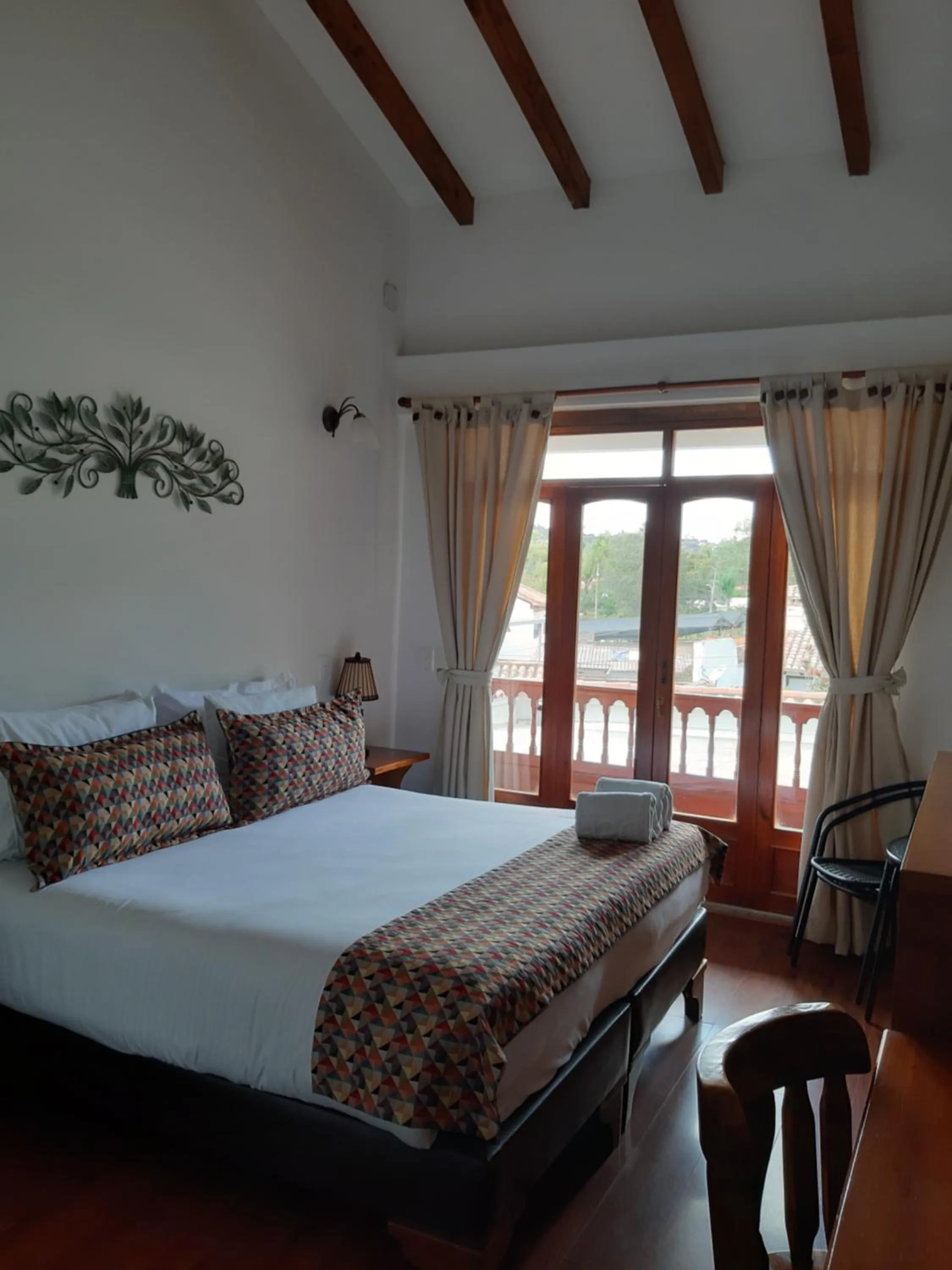 Property building, Bed in Hotel El Giro