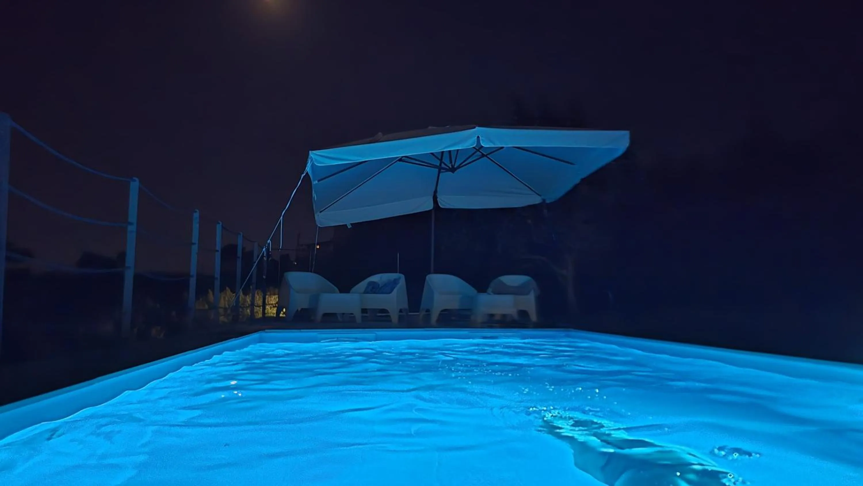 Swimming pool in Villa Malvasio Pool and Jacuzzi Room Sassari