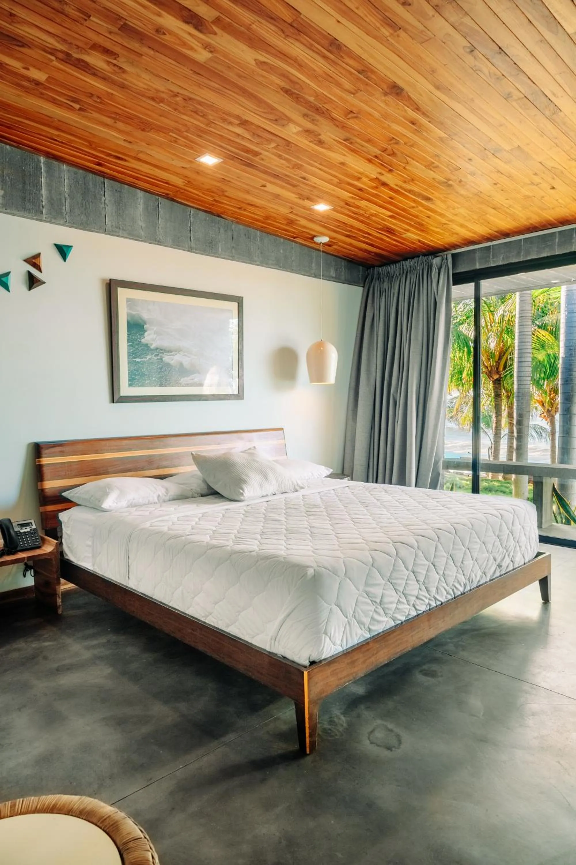 Bed in Puro Surf Hotel & Performance Academy