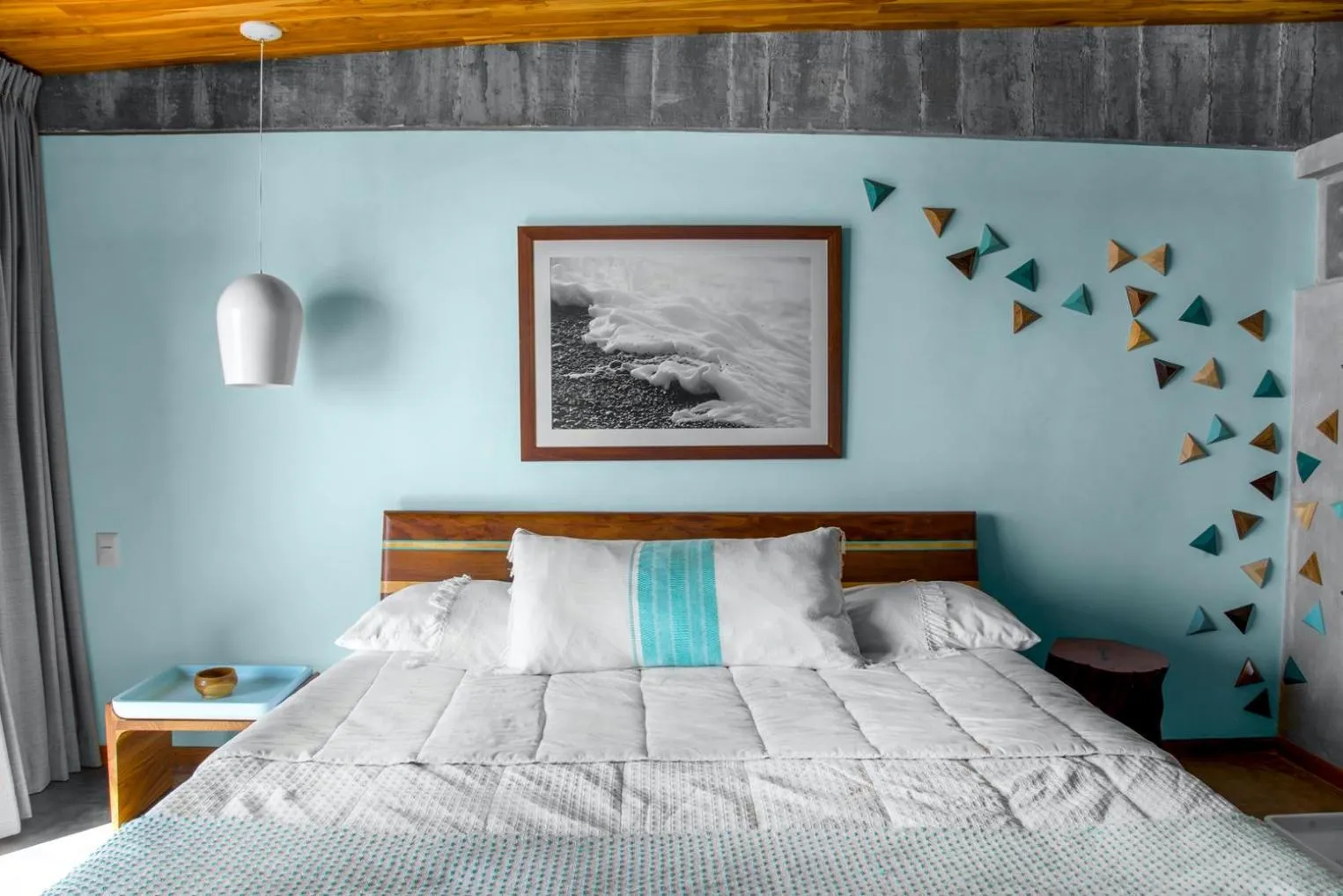 Bed in Puro Surf Hotel & Performance Academy