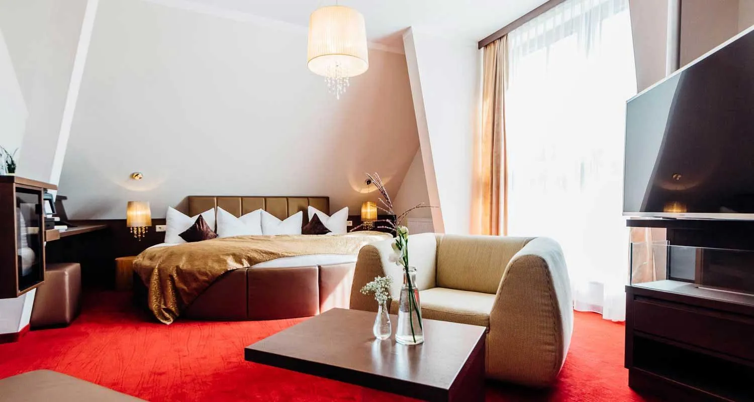 Living room, Bed in Erlebnishotel "Zur Schiffsmühle" GmbH