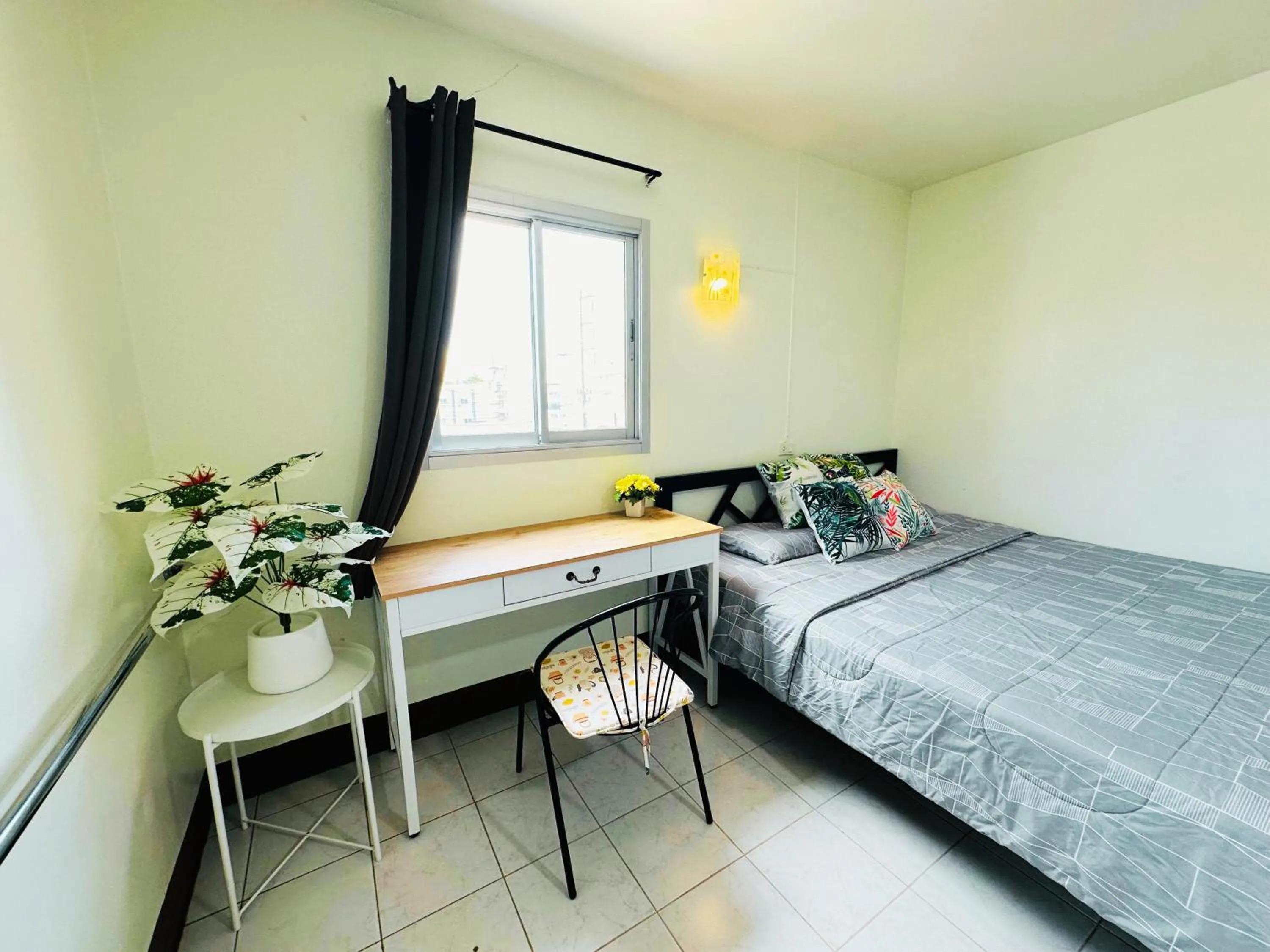 Bed in K.L.Apartment