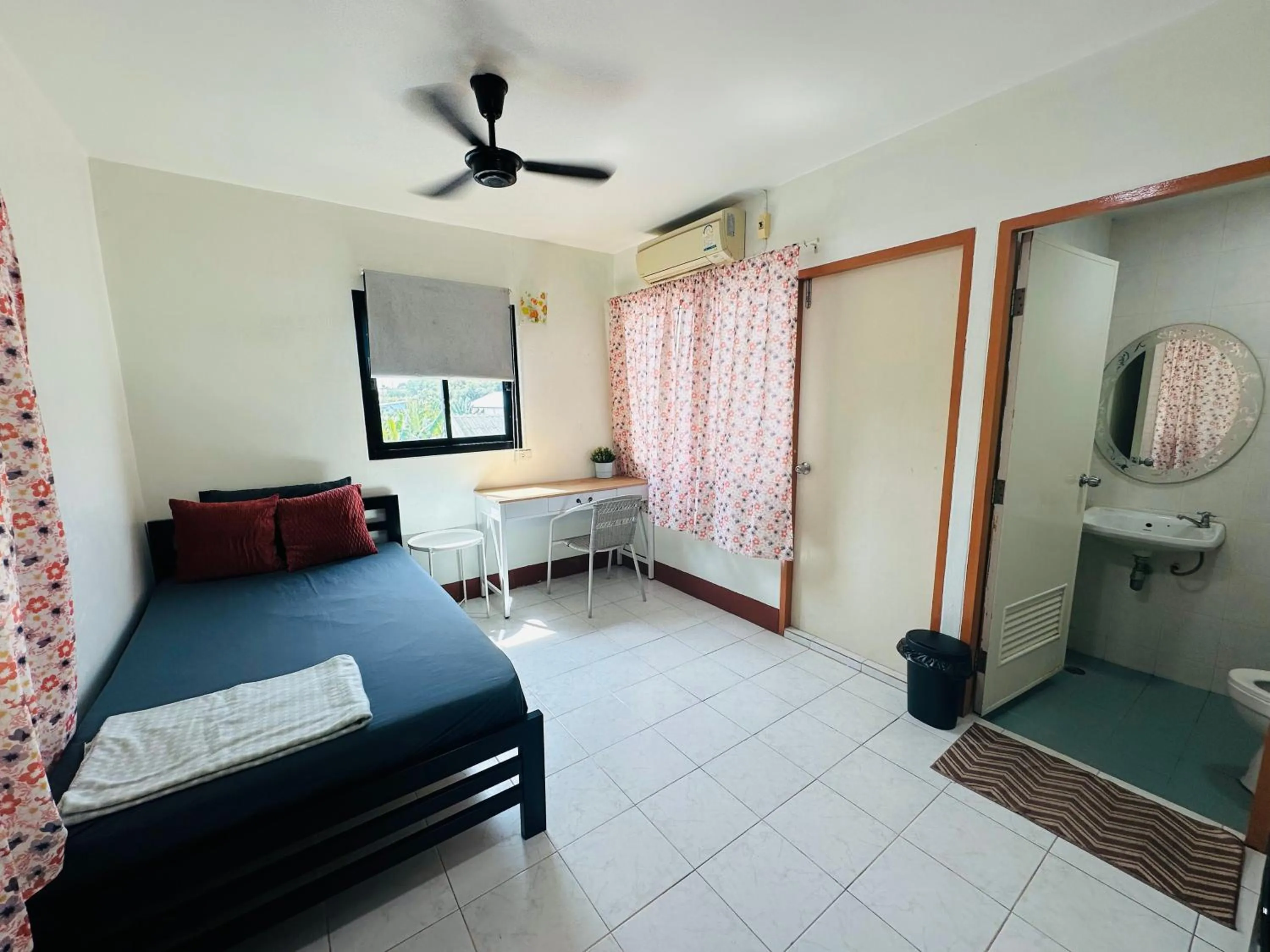 Bed in K.L.Apartment