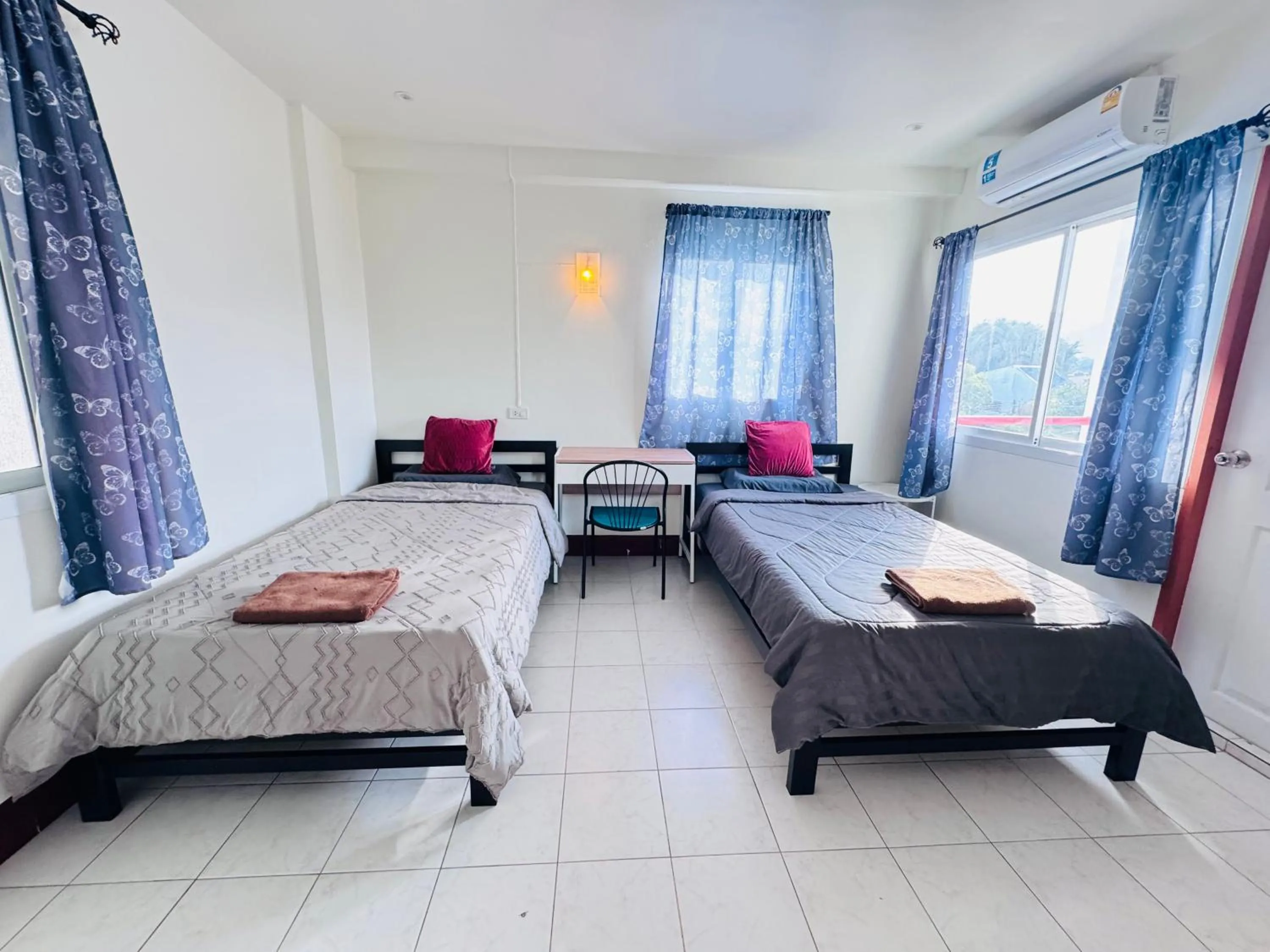 Bed in K.L.Apartment