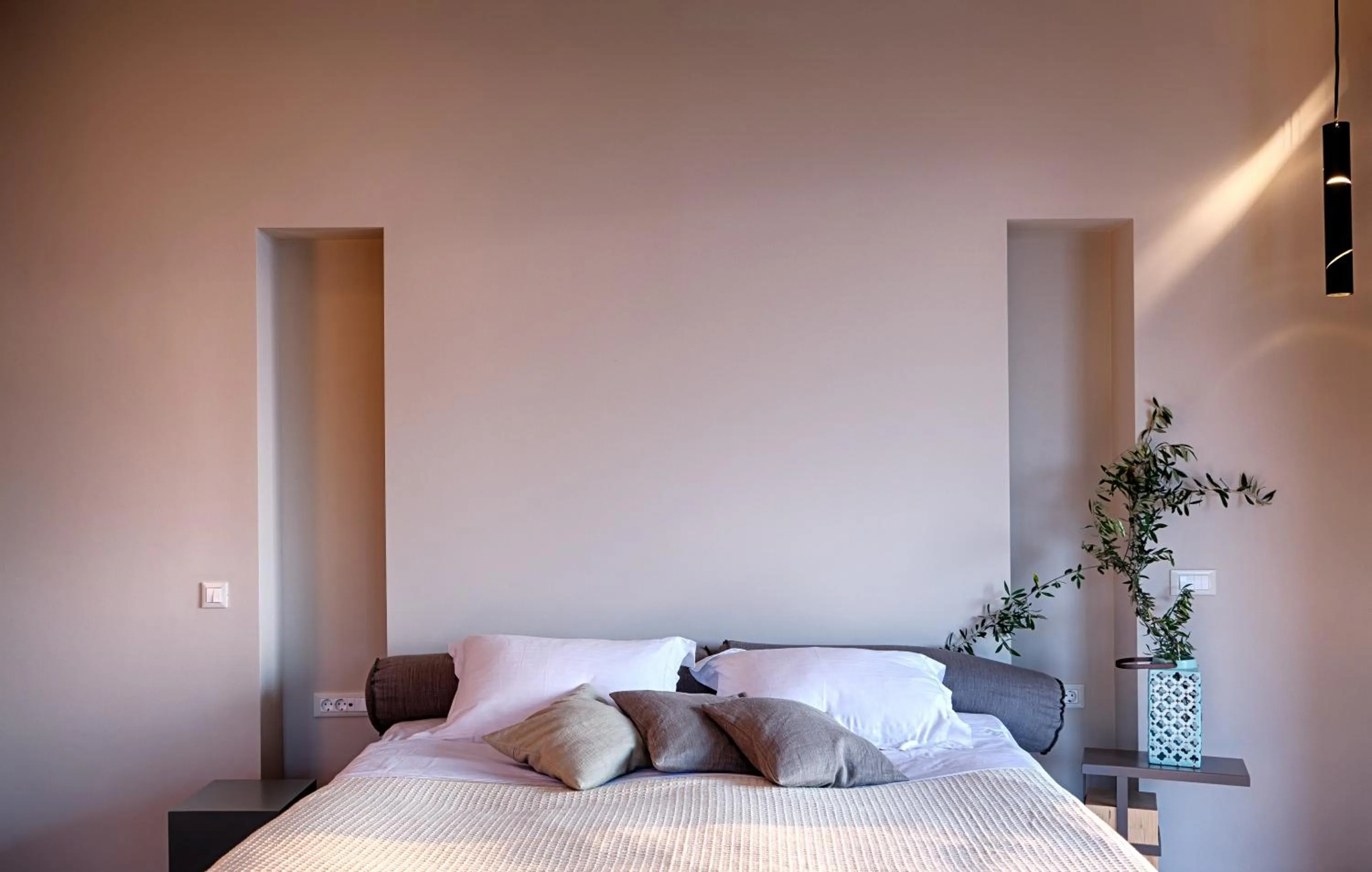 Bed in Euphoria Suites