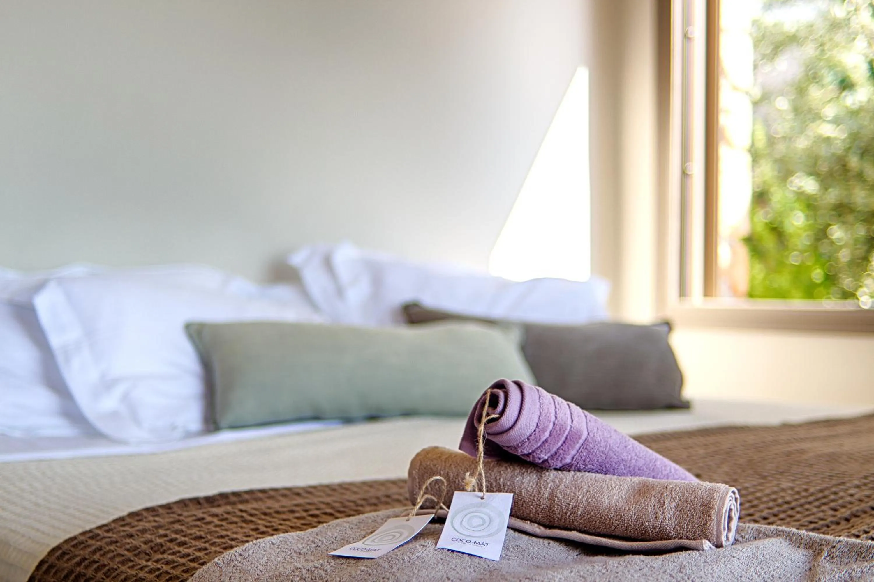 Bed in Euphoria Suites