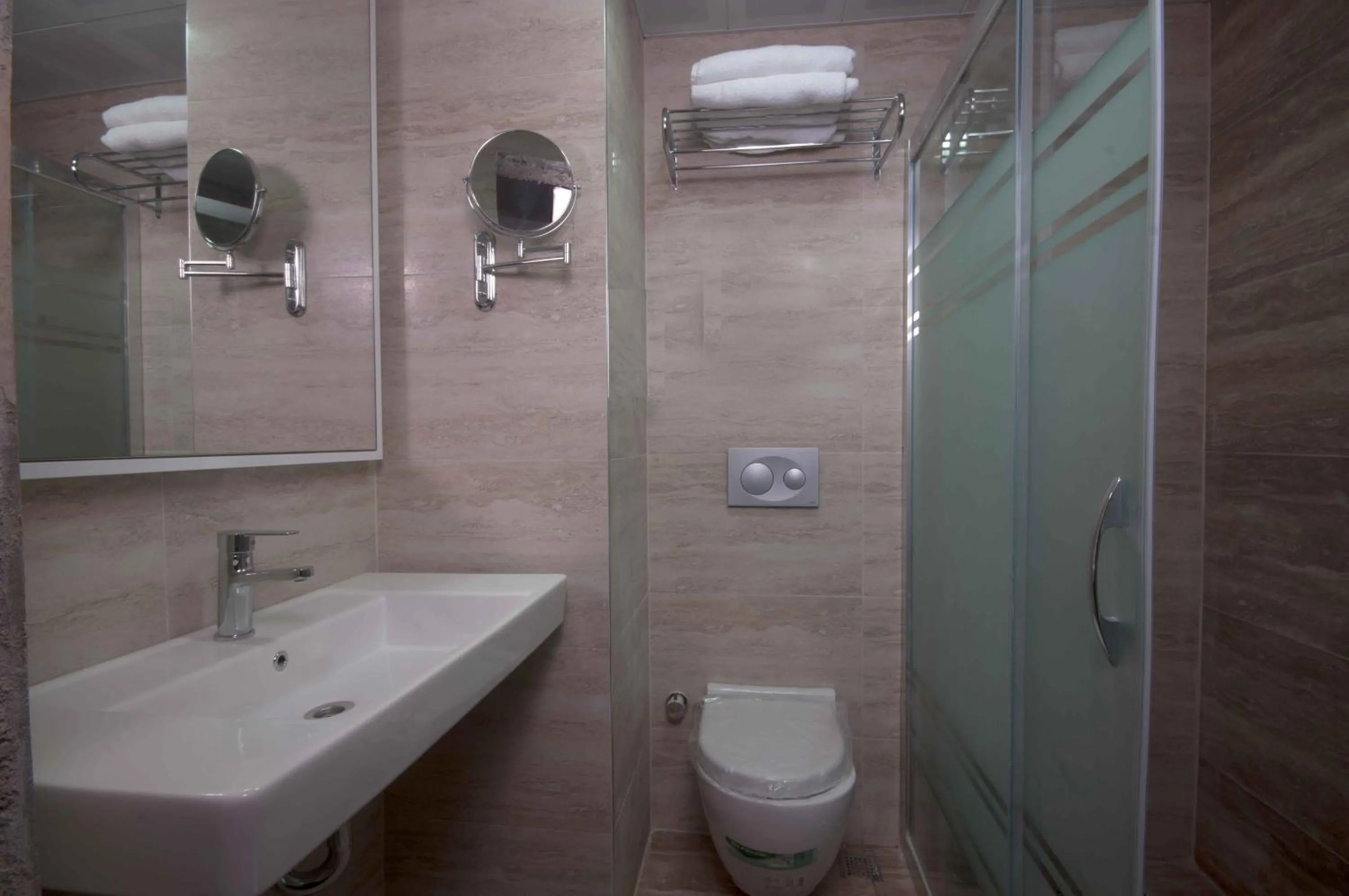 Bathroom in Idas Hotel