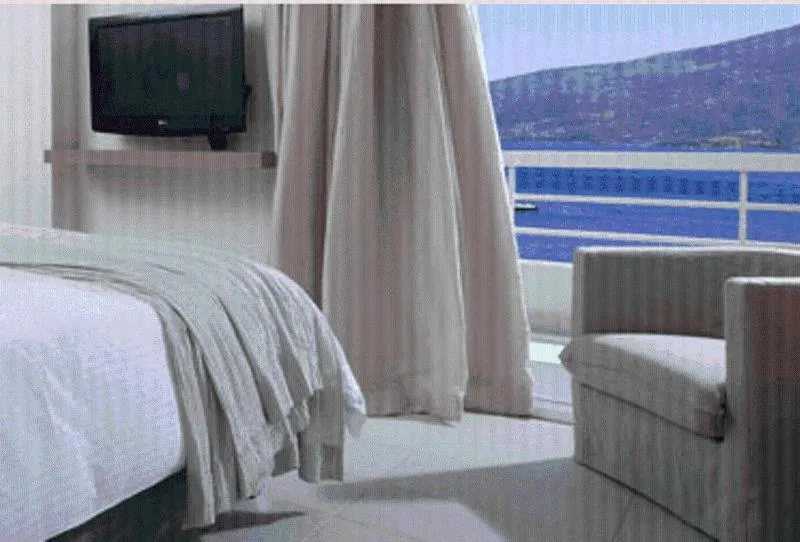 Bed in Sirene Blue Luxury Beach Resort