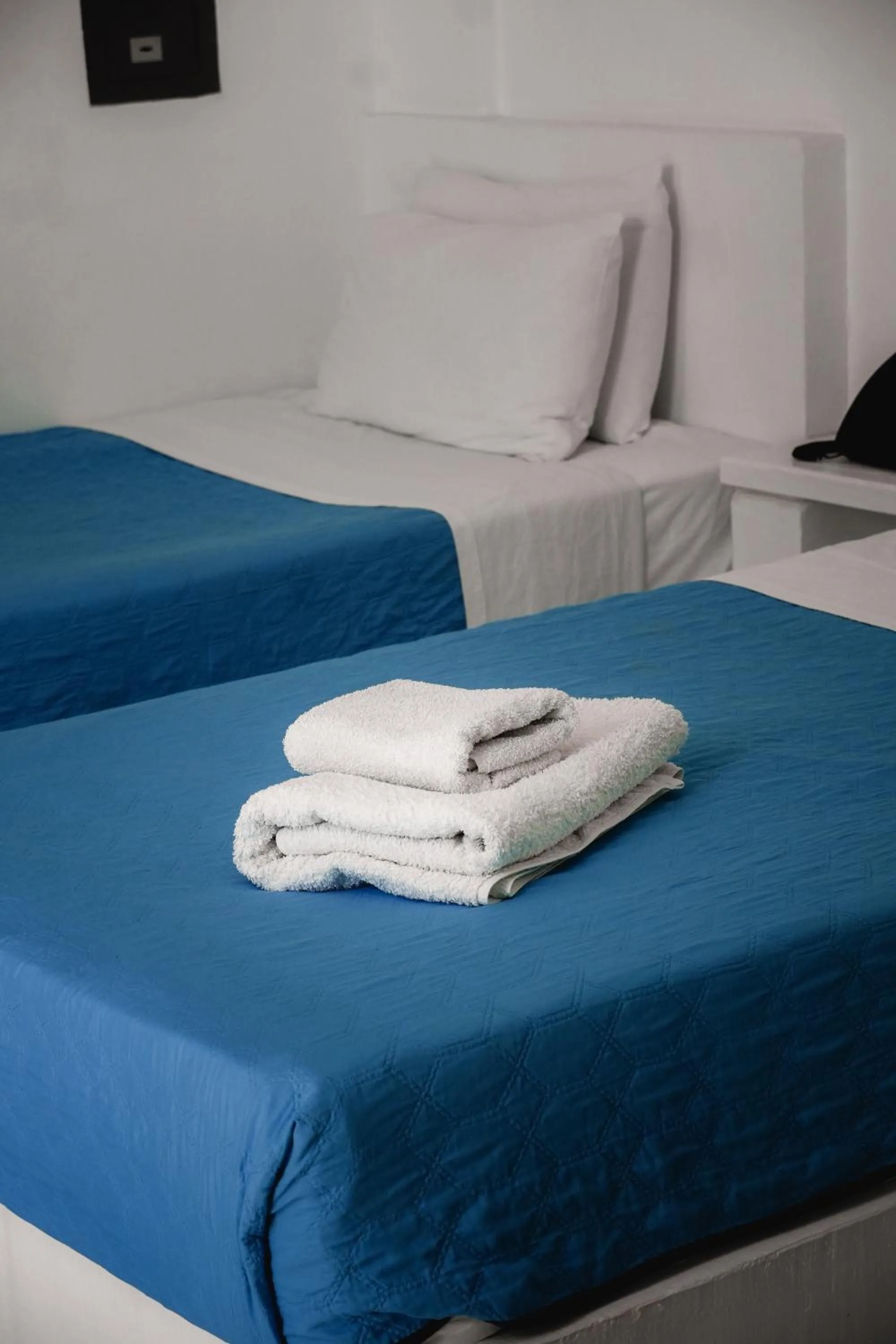 towels, Bed in Roula Villa Studios & Apartments
