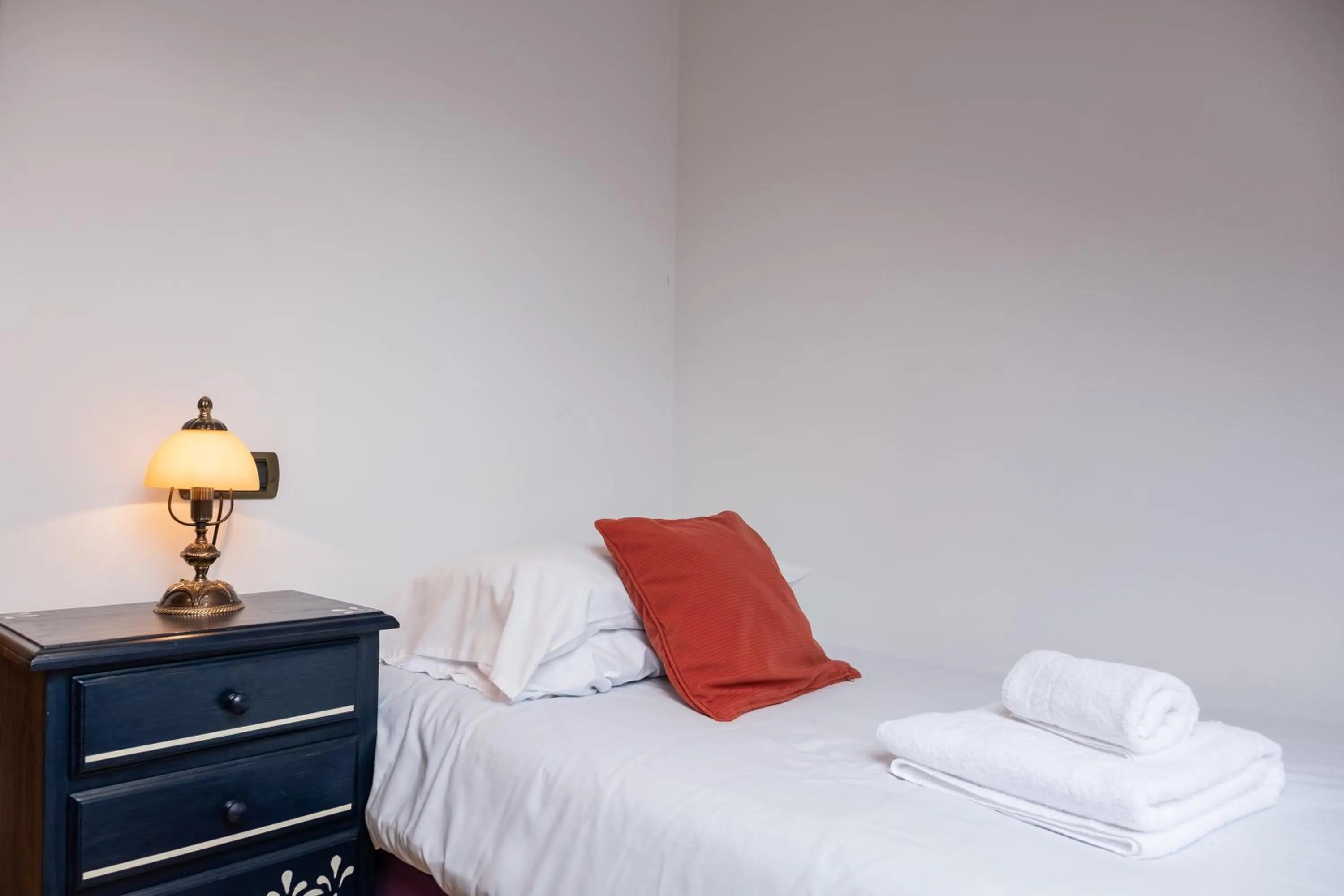 Bed in Apartamentos O Almacen