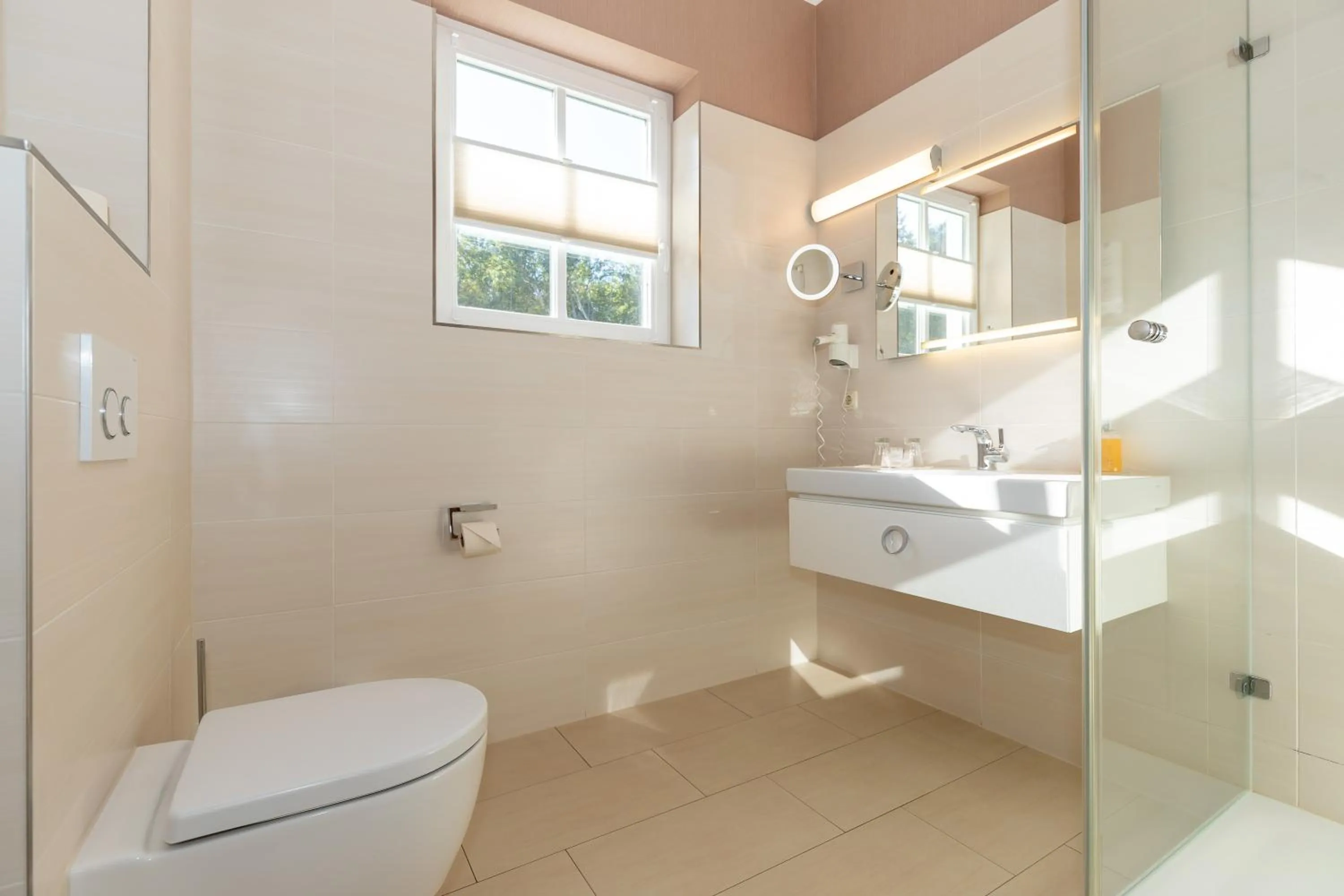 Bathroom in HOTEL am STRAND