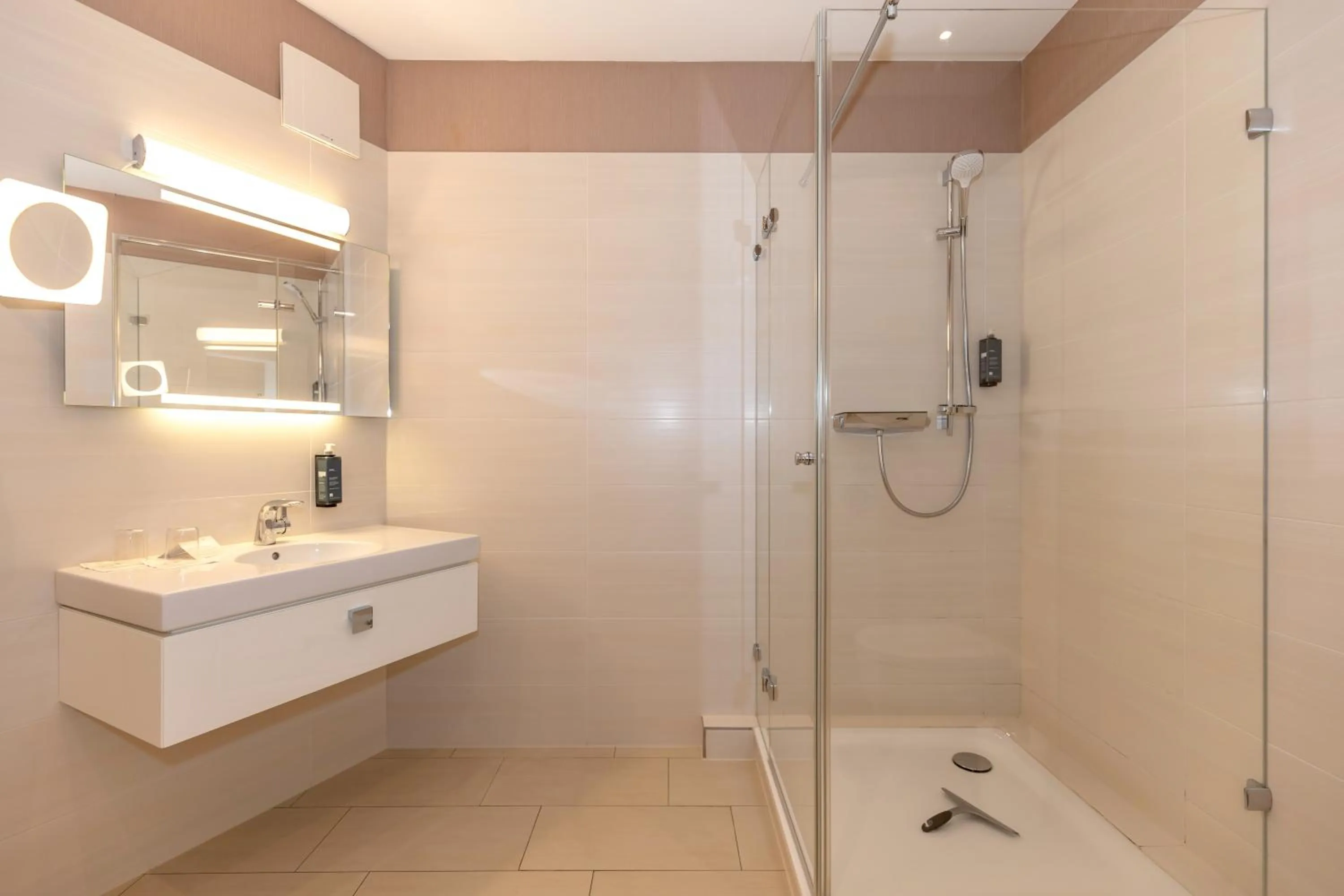 Bathroom in HOTEL am STRAND