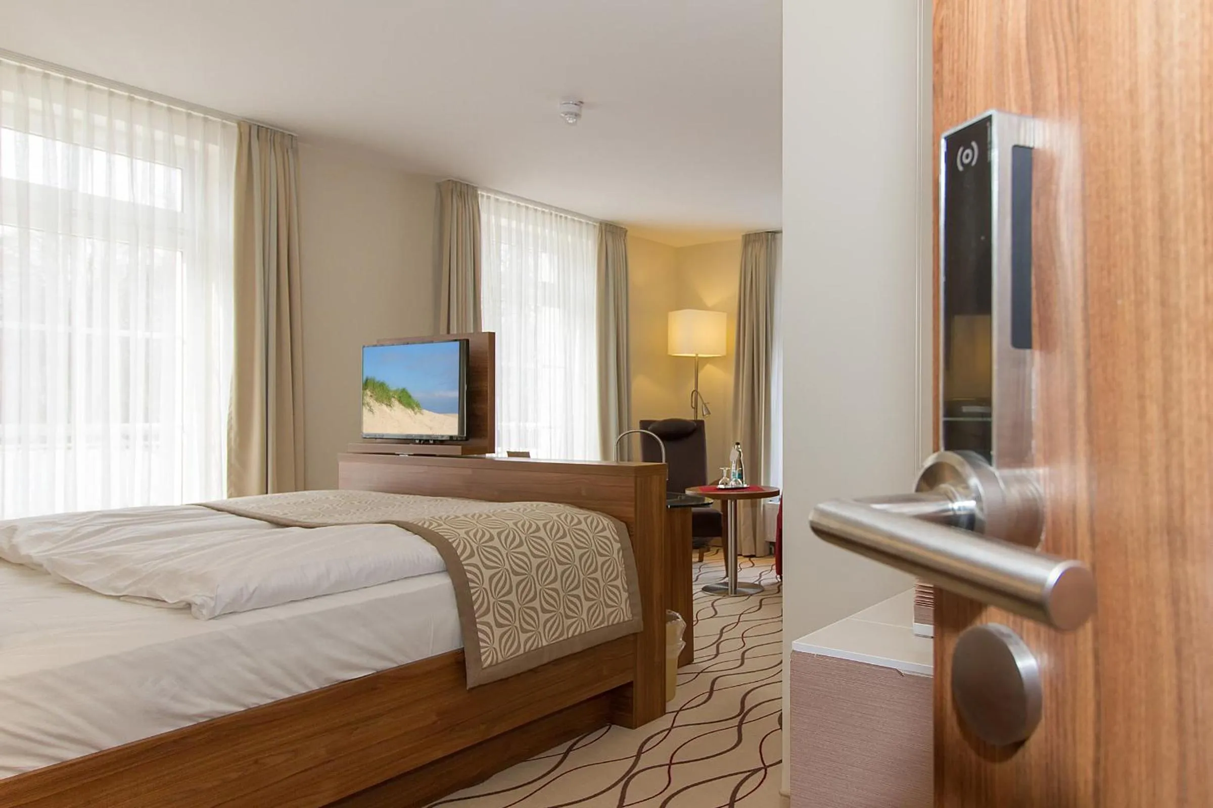 Photo of the whole room, Bed in HOTEL am STRAND