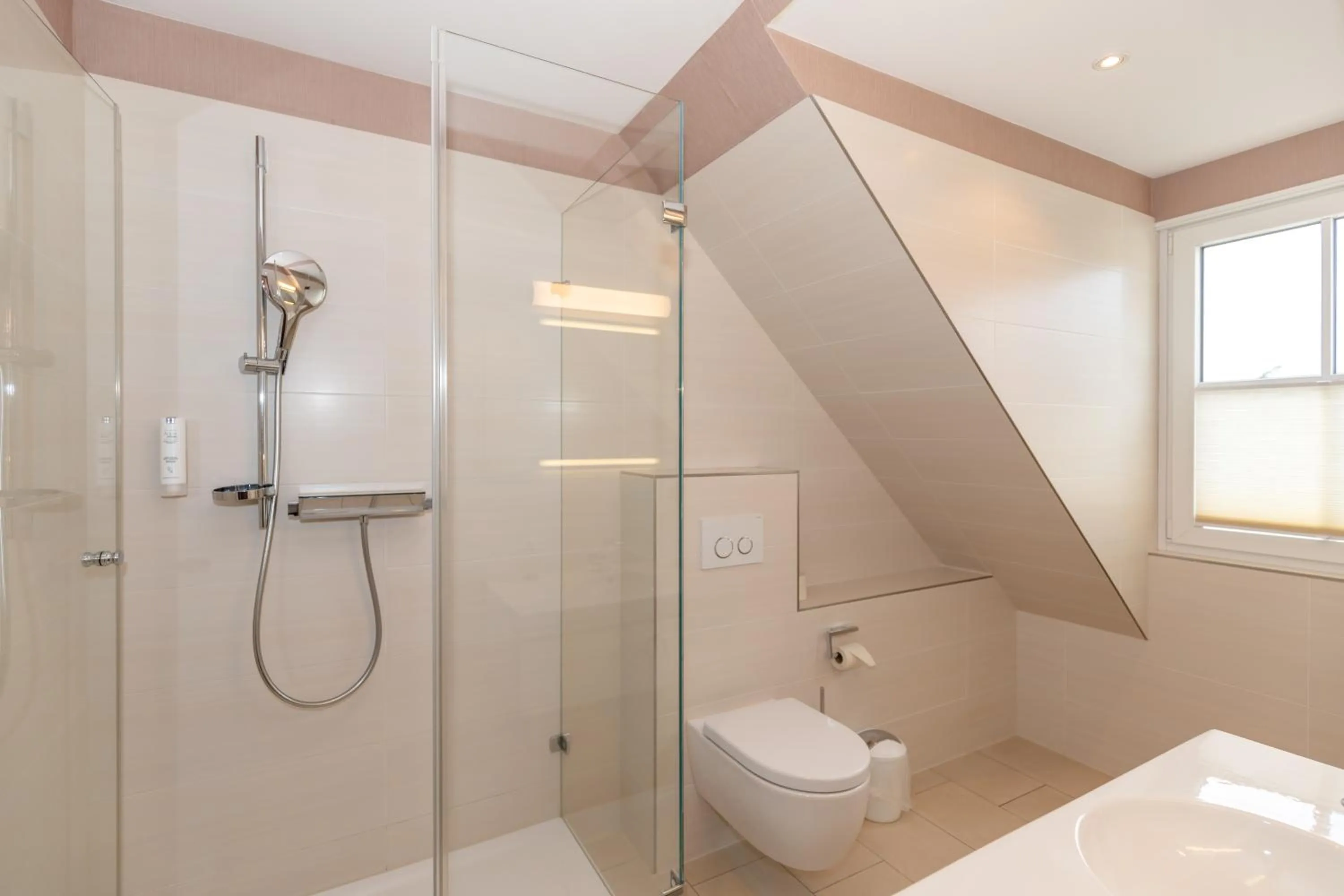 Bathroom in HOTEL am STRAND