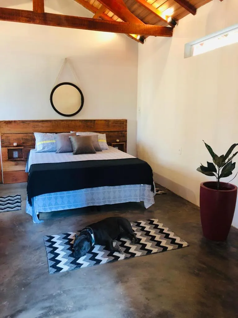 Bed in Pousada Chalés da Lua