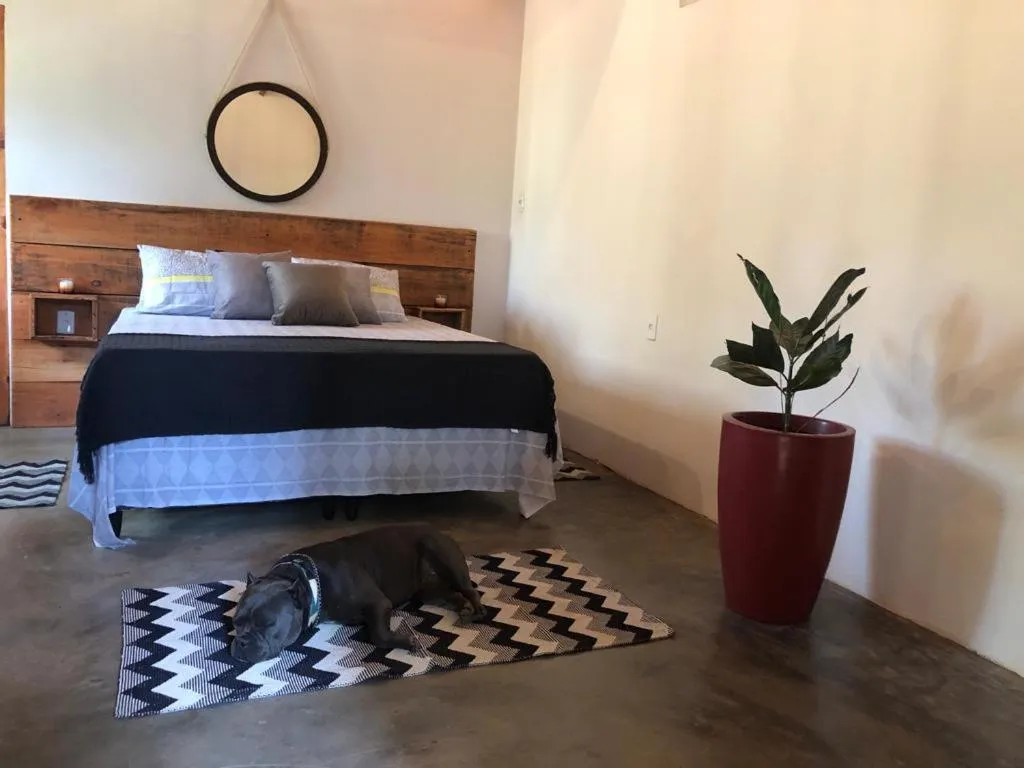 Photo of the whole room, Bed in Pousada Chalés da Lua