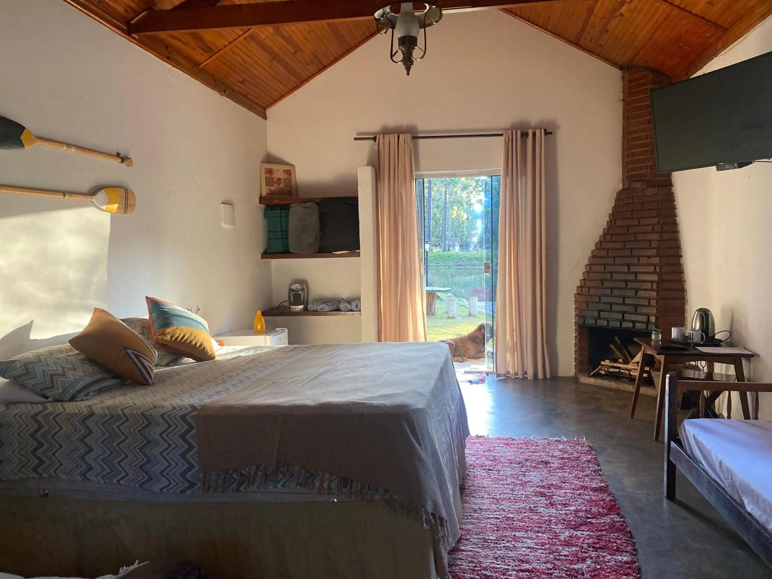 Photo of the whole room, Bed in Pousada Chalés da Lua