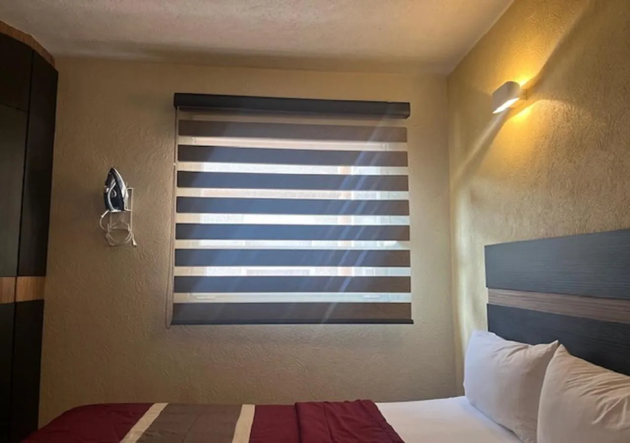 furniture, Bed in Ibeurohotel Guadalajara Expo