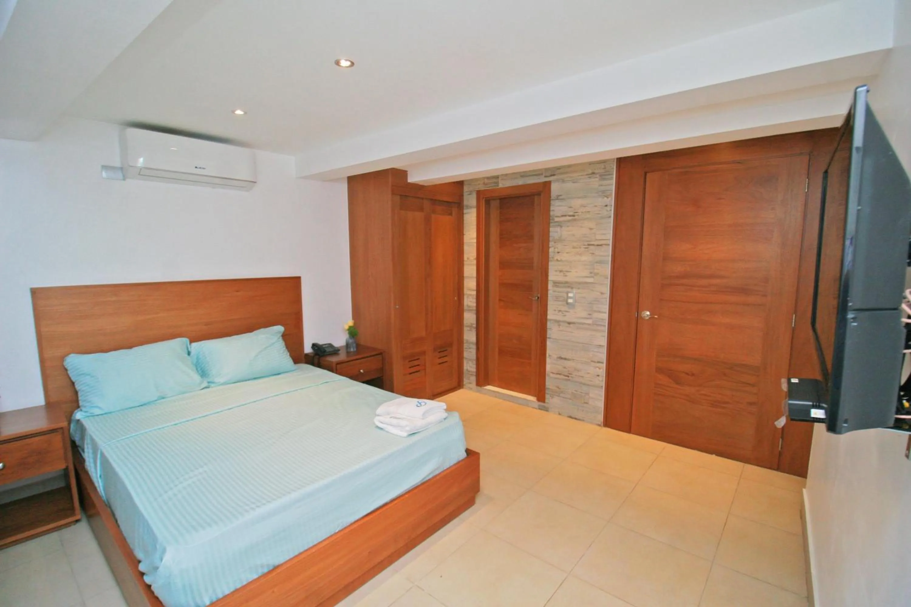 Bed in Palmetto Hotel