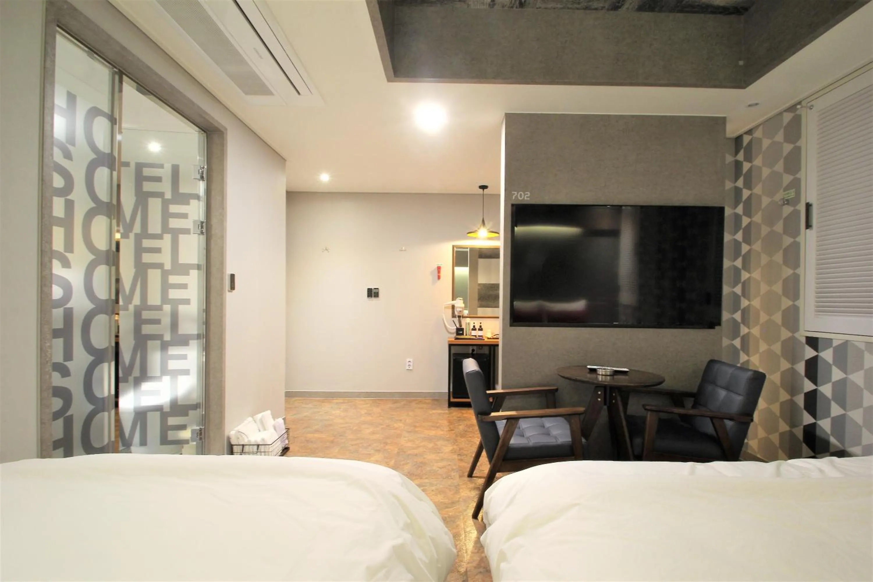 Bedroom, TV/Entertainment Center in Some Hotel