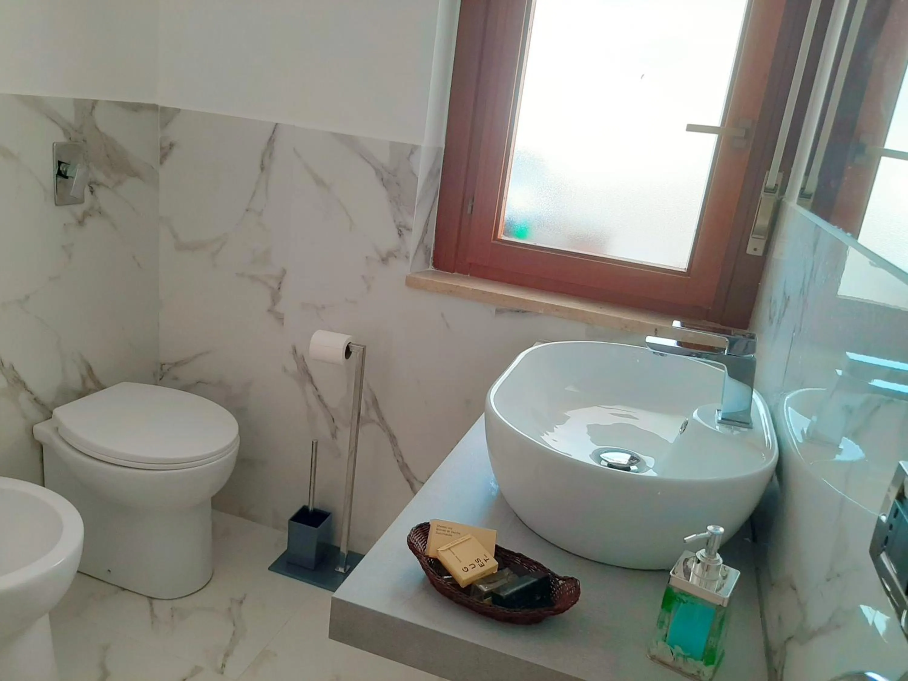 Bathroom in Acquamarina Apartment with Terrace