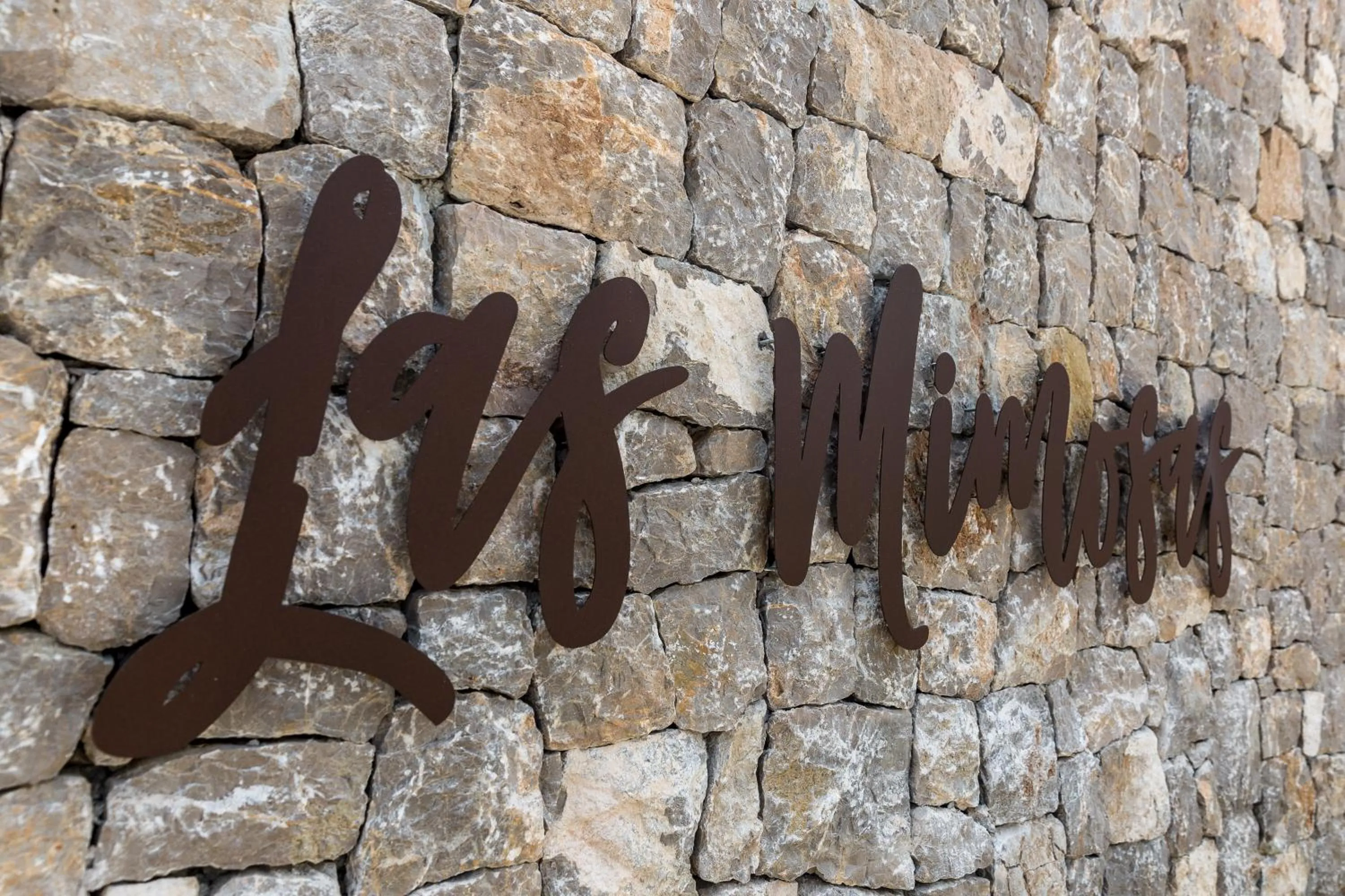 Property logo or sign in Hotel Boutique & Spa Las Mimosas Ibiza