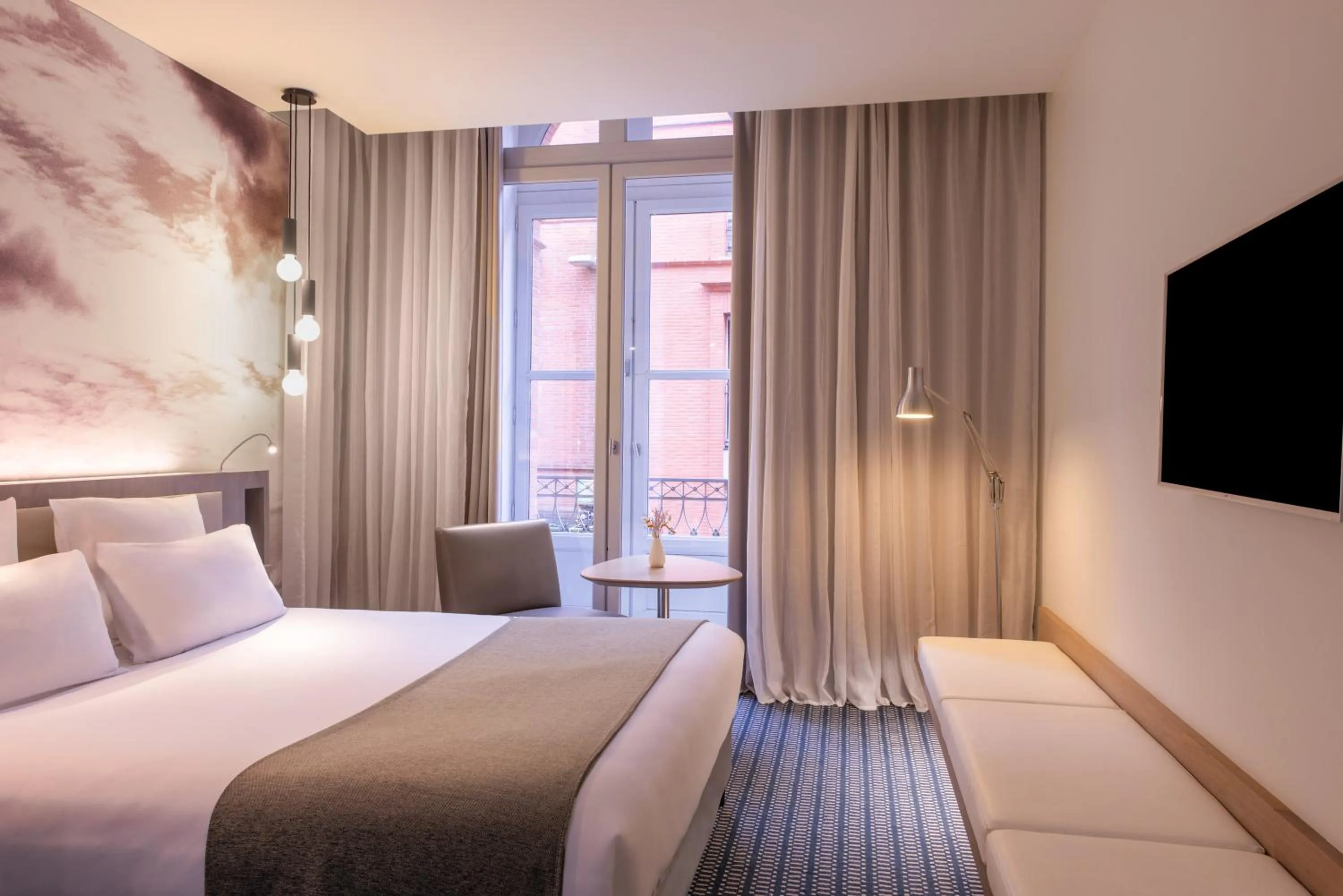 Bedroom, Bed in Le Grand Balcon Hotel