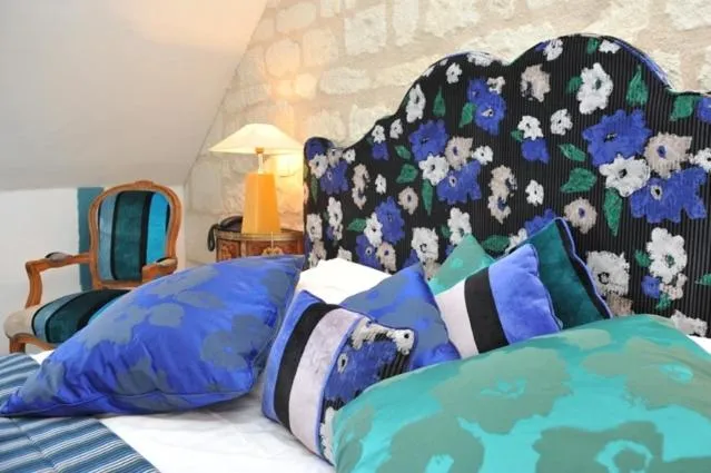 Bed in Logis Demeure de la Vignole