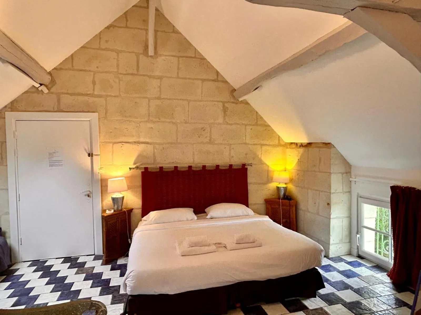 Bed in Logis Demeure de la Vignole