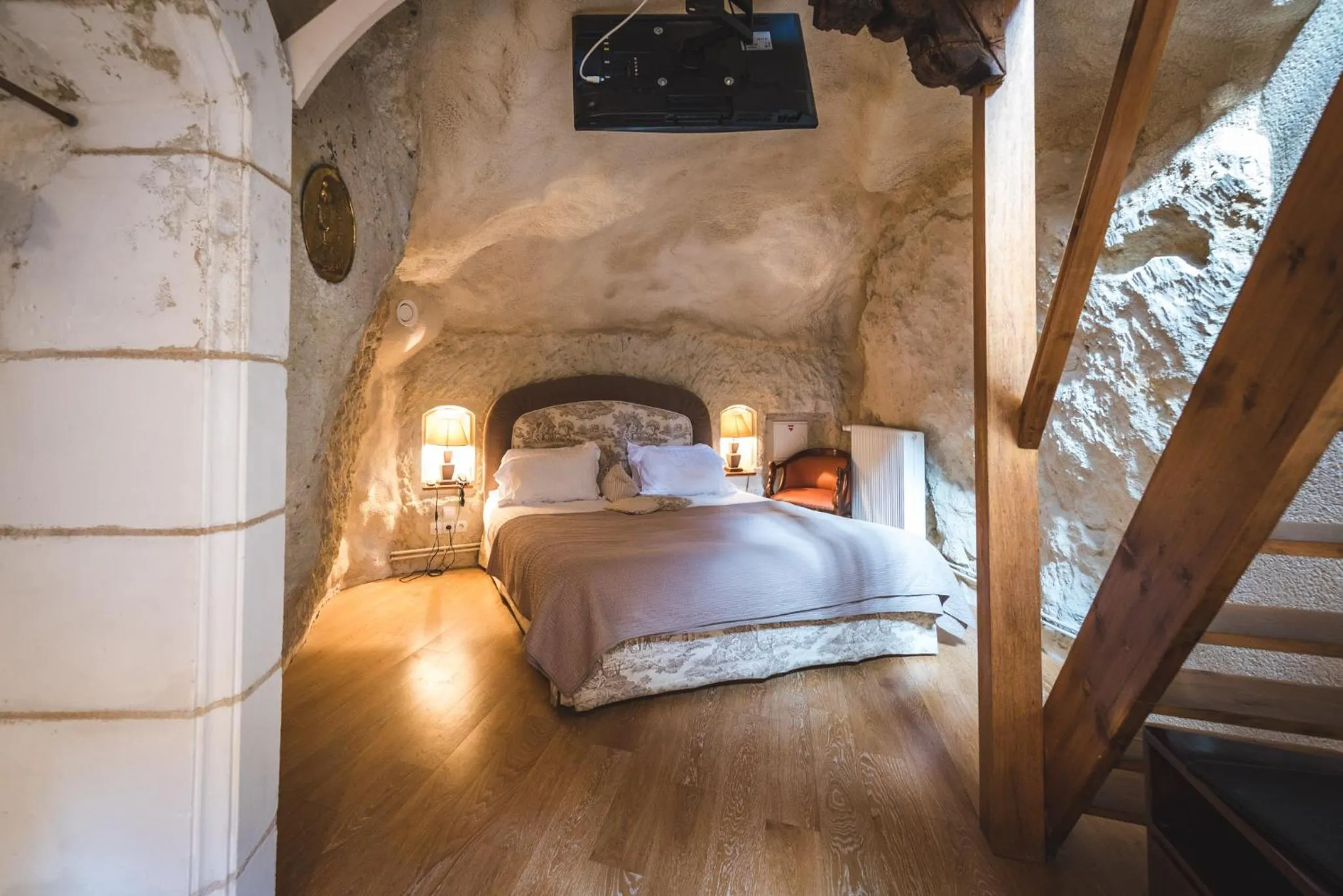 Bed in Logis Demeure de la Vignole