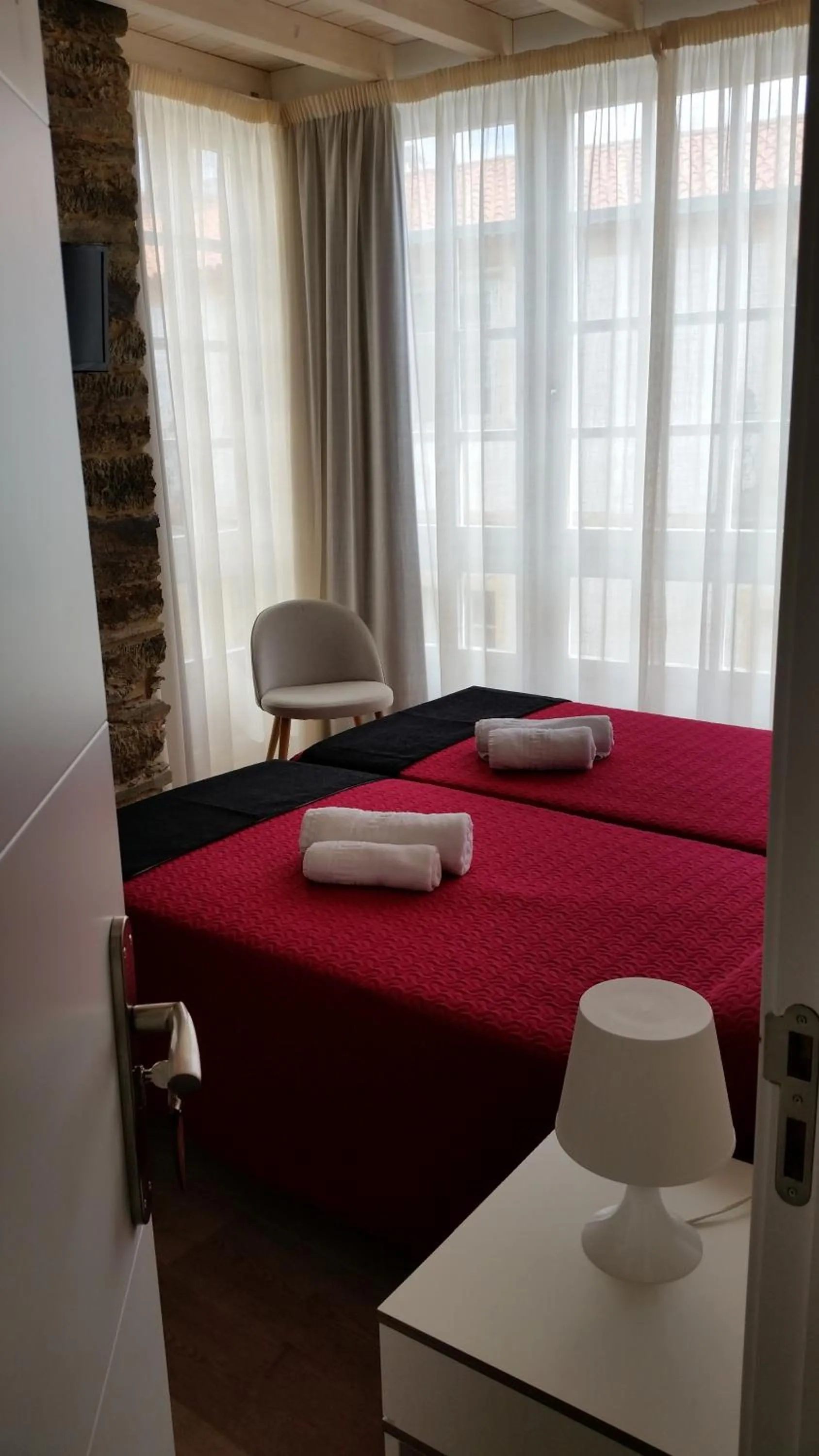 Bed in Pensión Domus Gallery