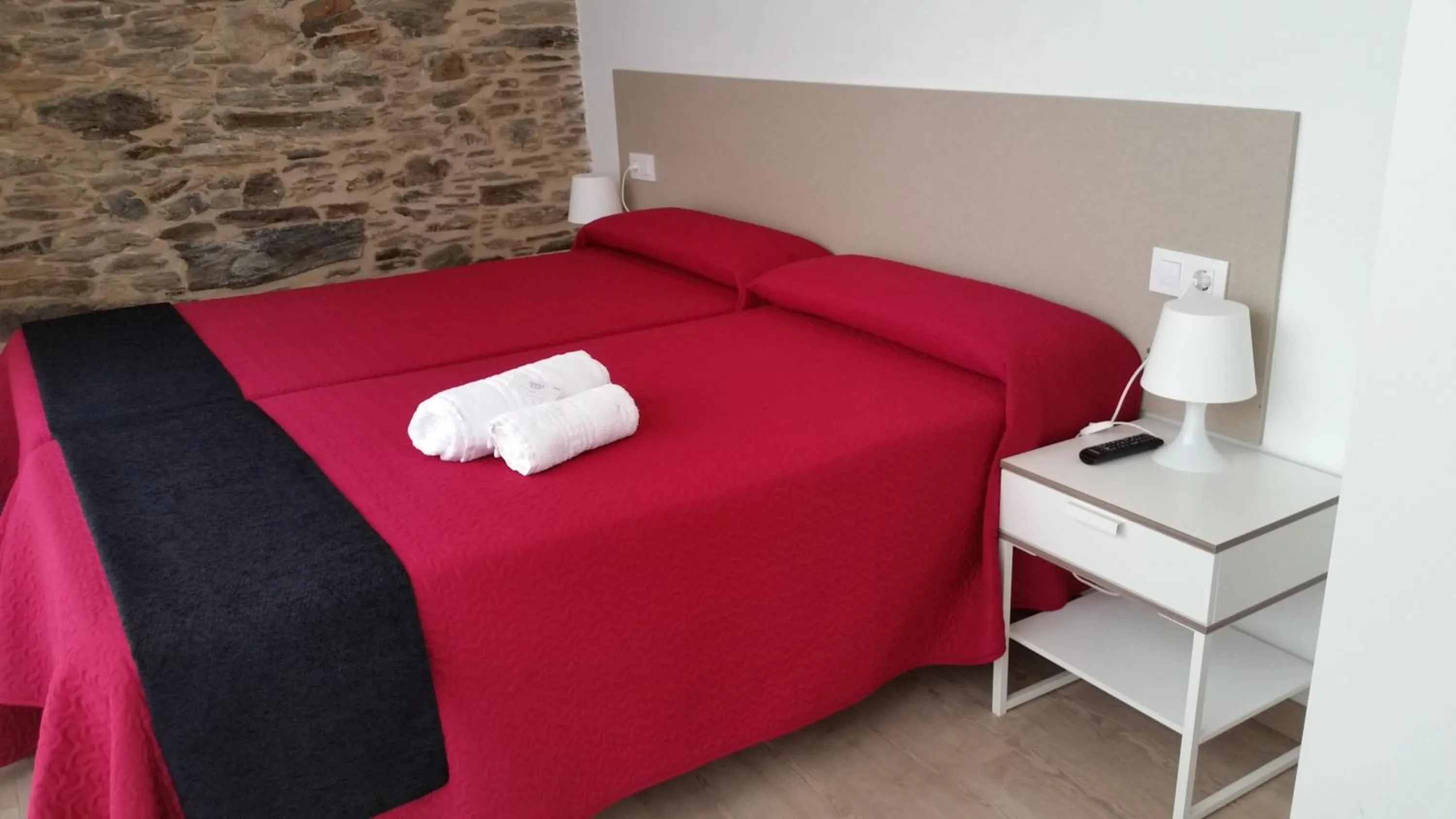 Bed in Pensión Domus Gallery