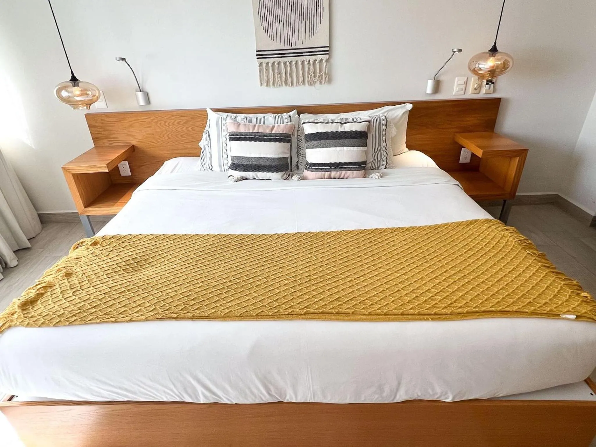 Bed in Opal Suites Apartments
